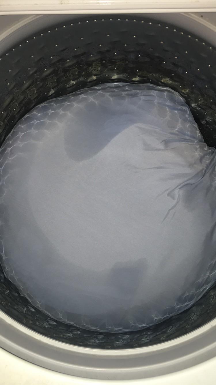 Washed clothes with a fitted sheet and the fitted sheet consumed the