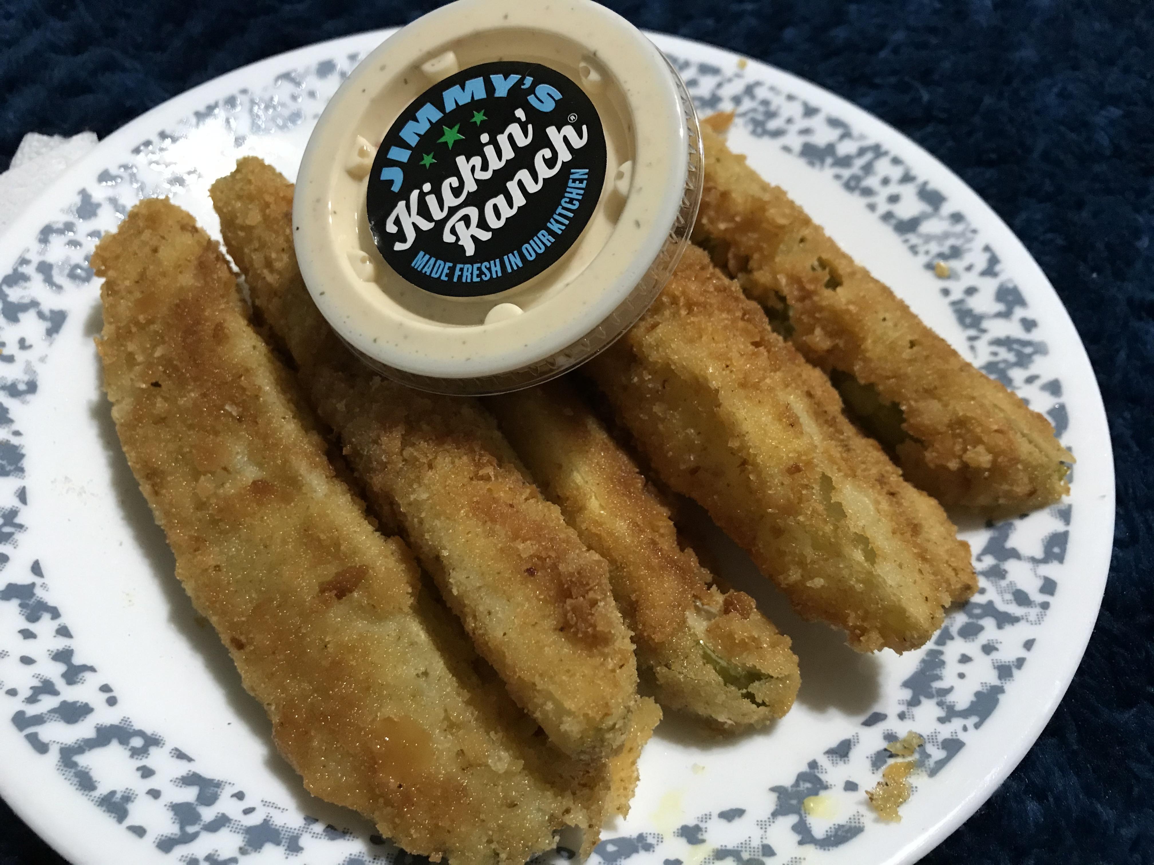 Jimmy Pickles breaded with day old French bread crumbs fried in peanut oil with a side of Kickin