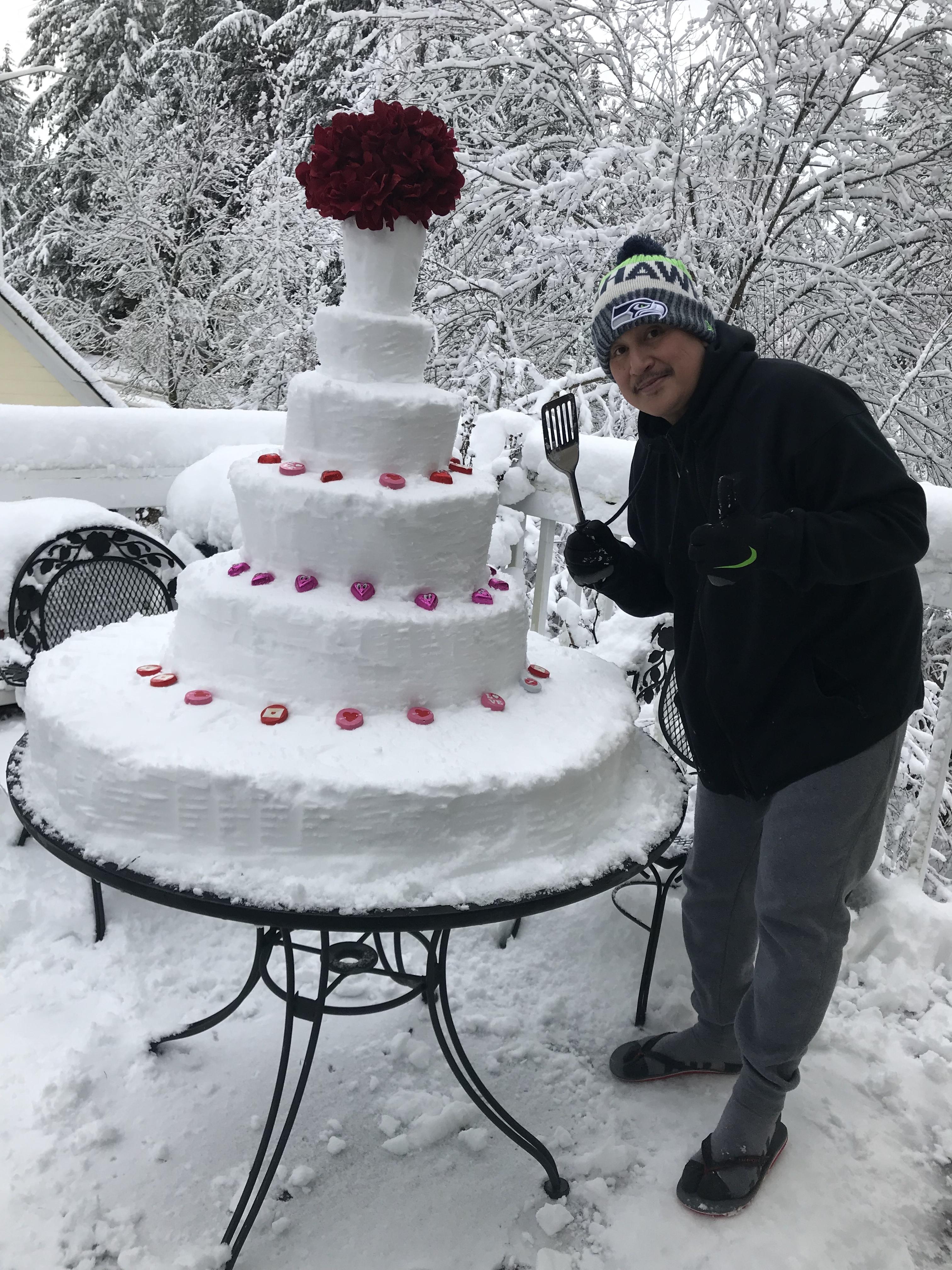 My uncle visiting from the Philippines has never seen snow. This is what happened today.