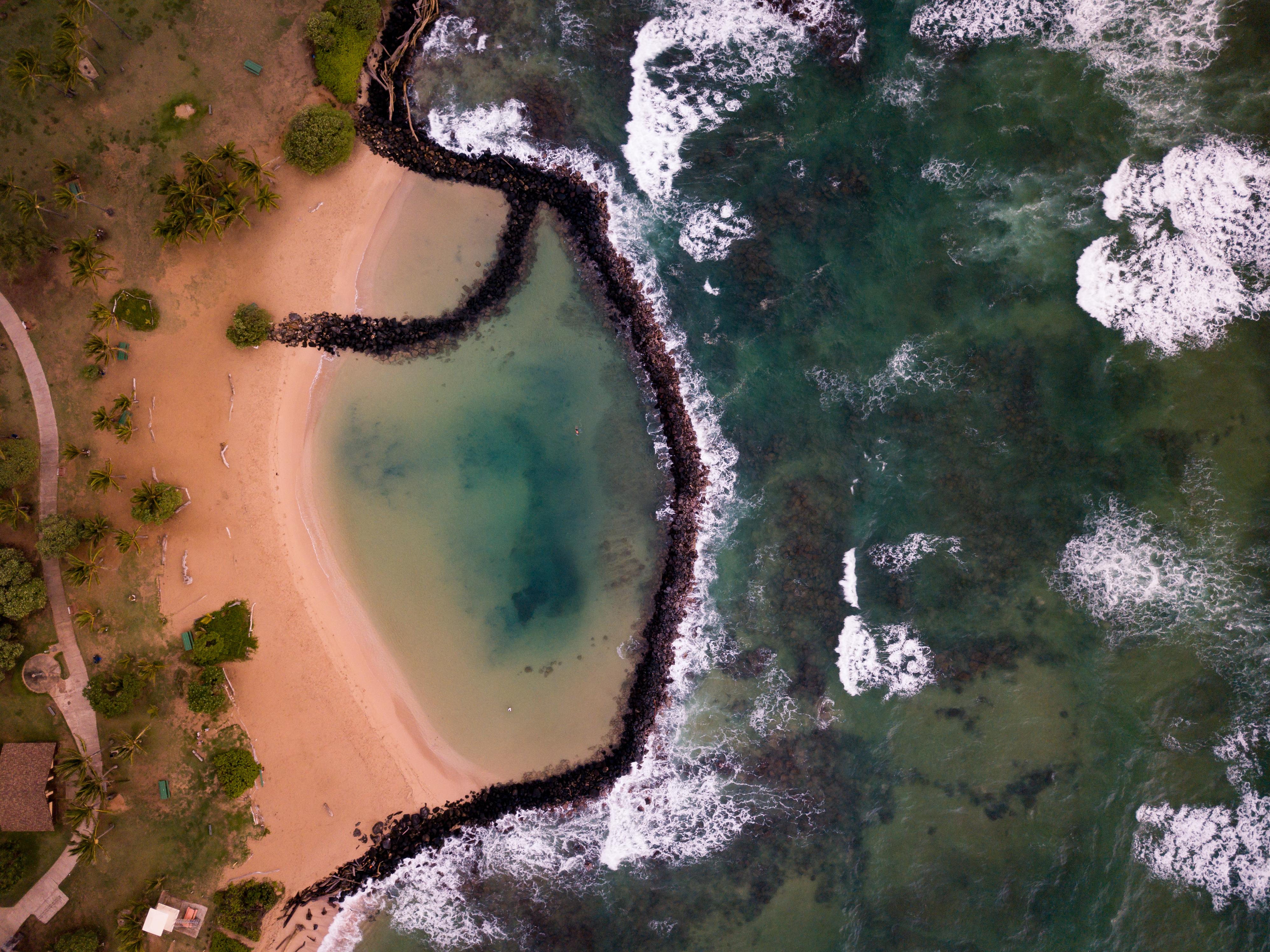 The morning calm of the pools at Lydgate Park. r/kauai