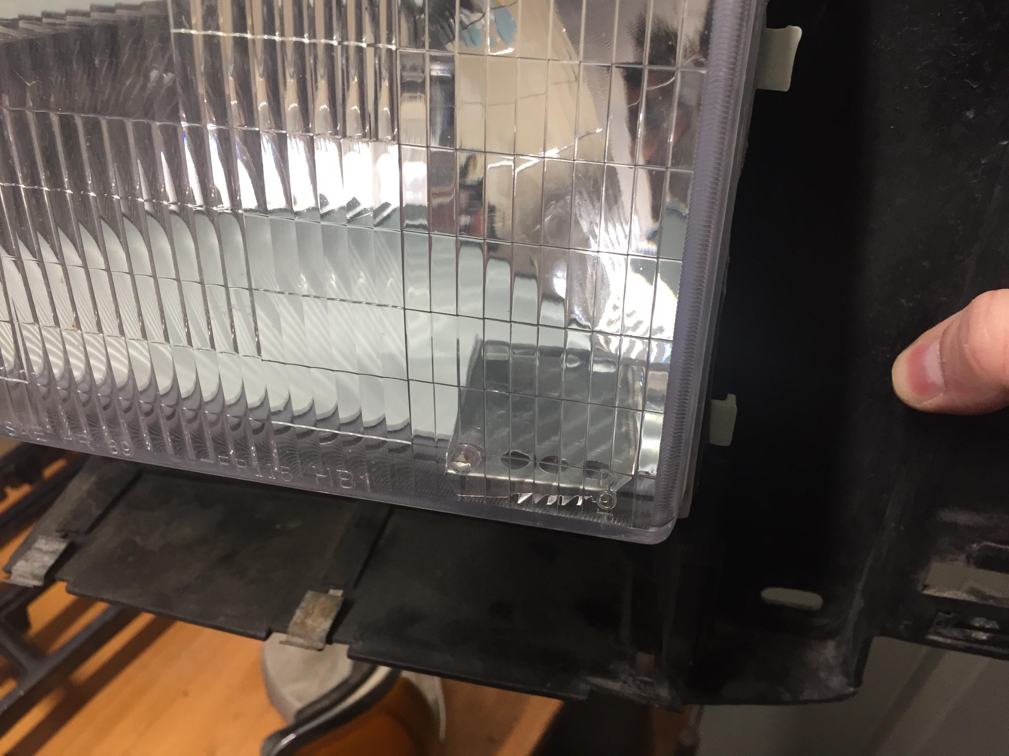 What is this loose piece of metal in my headlight? r/MechanicAdvice