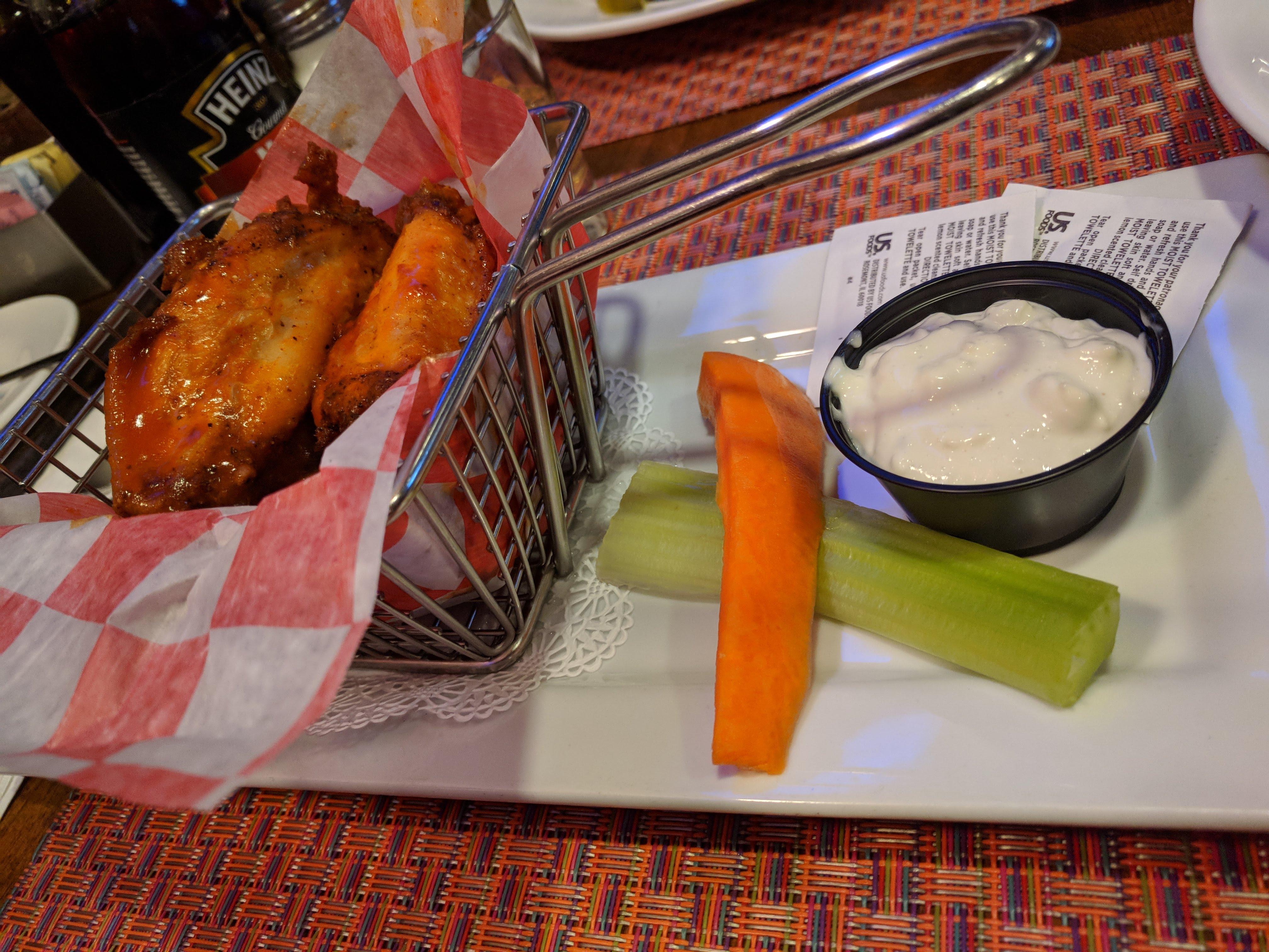 Buffalo Wings in a miniature fryer basket with fancy veg r/WeWantPlates