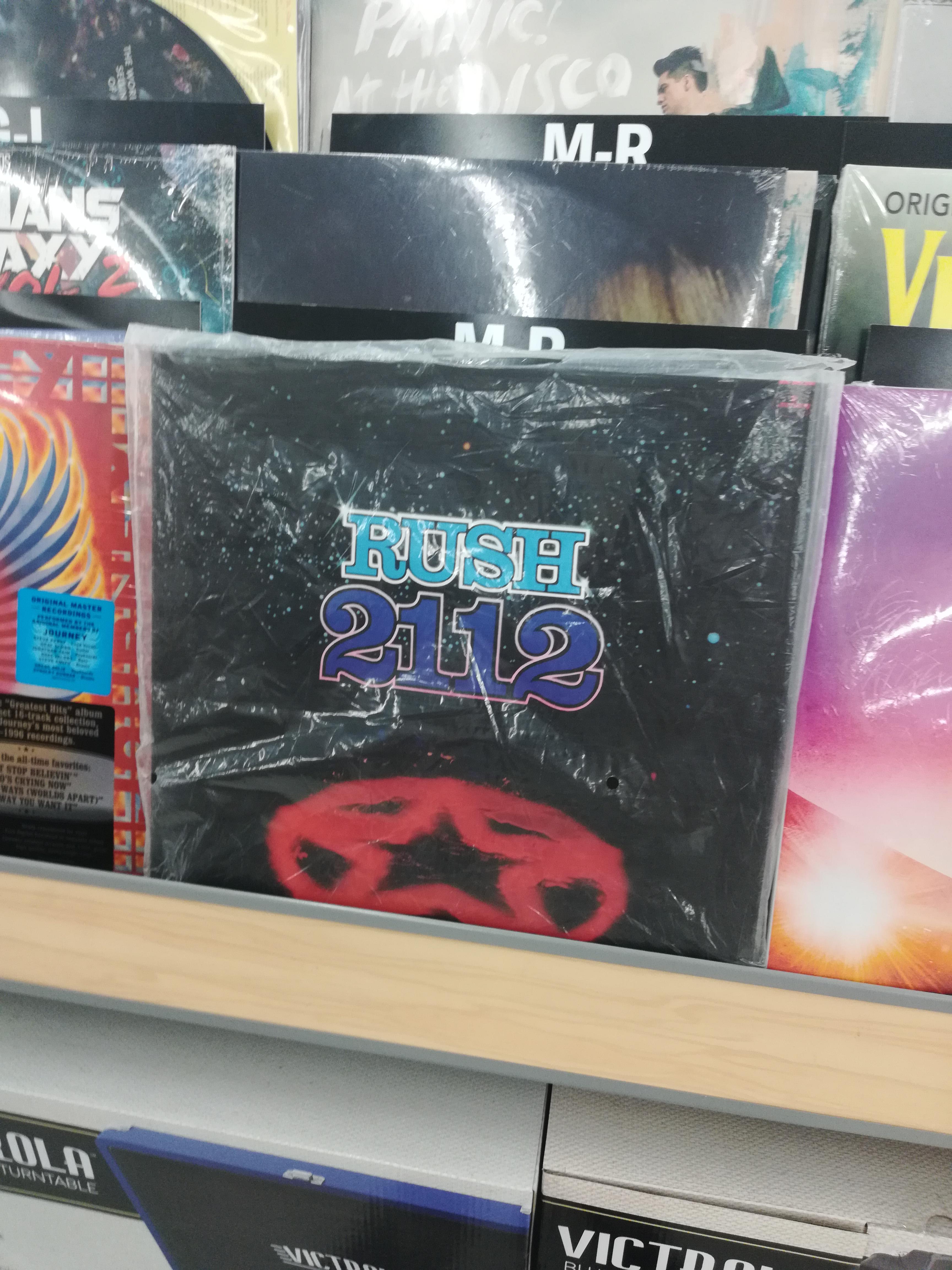 Found a 2112 vinyl at Walmart, sadly no other Rush records though r/rush