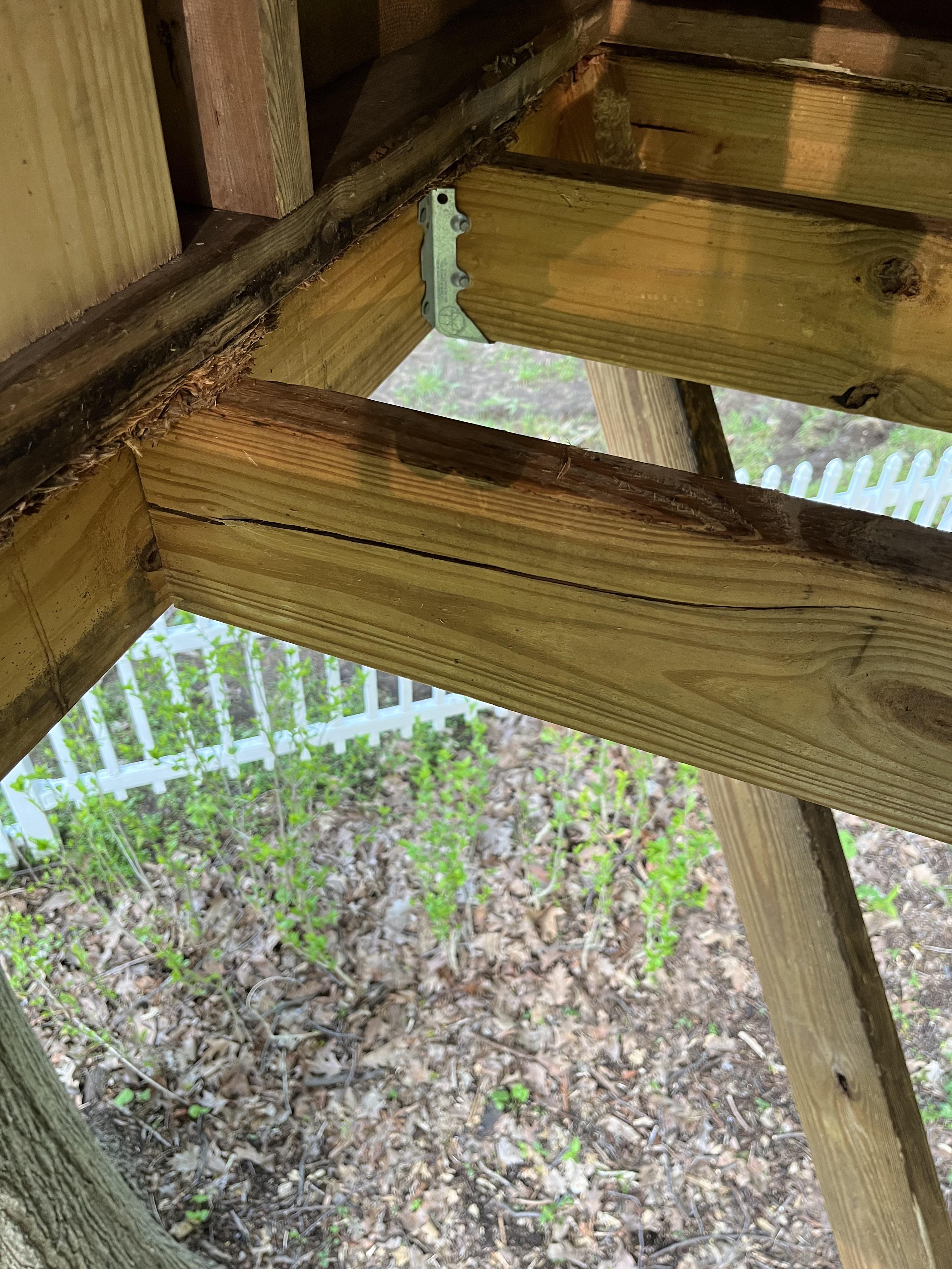 How can I support and strengthen this cracked floor joist? It holds my