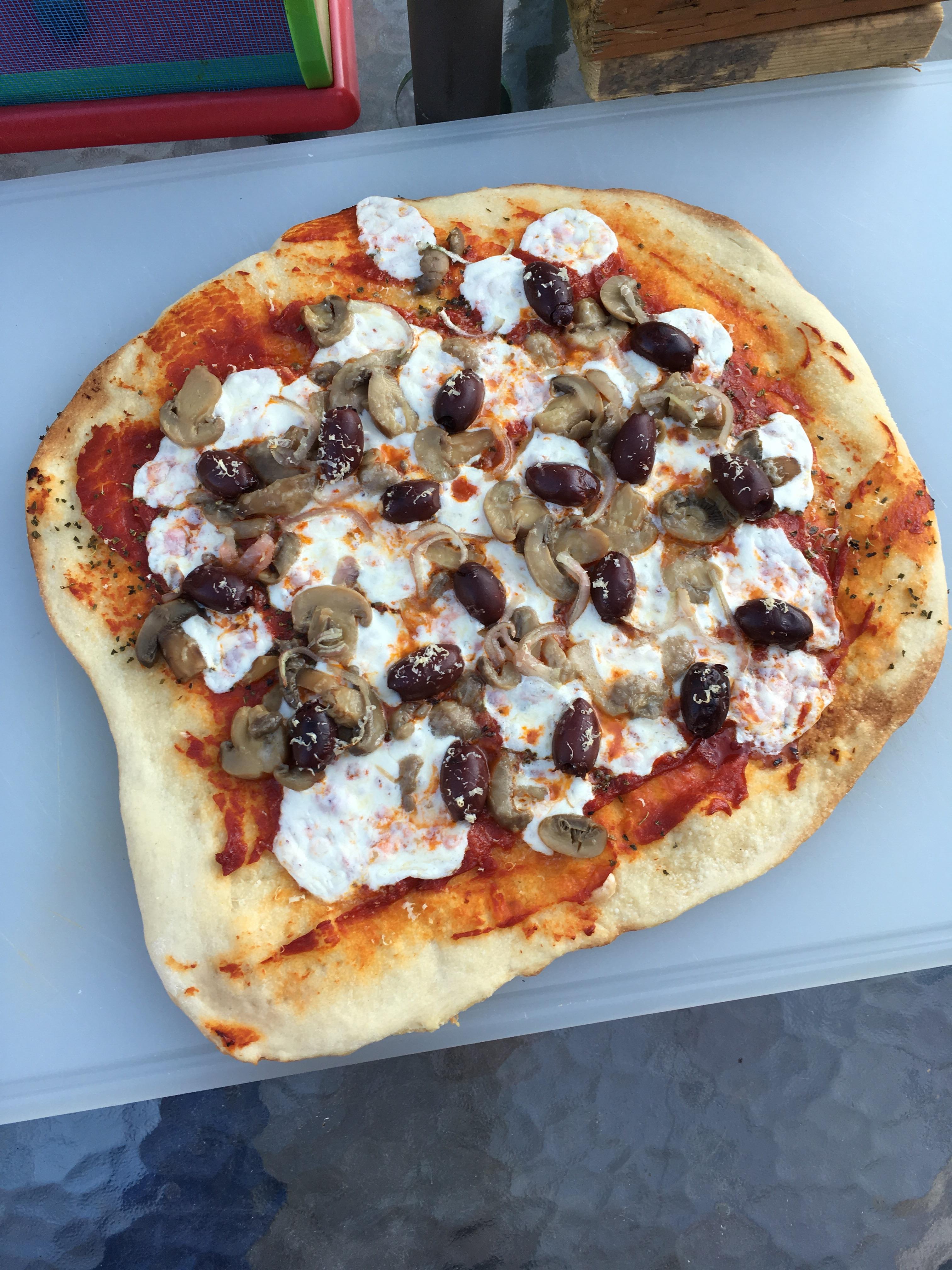 [homemade] kalamata olive mushroom onion and fresh mozzarella pizza r/food