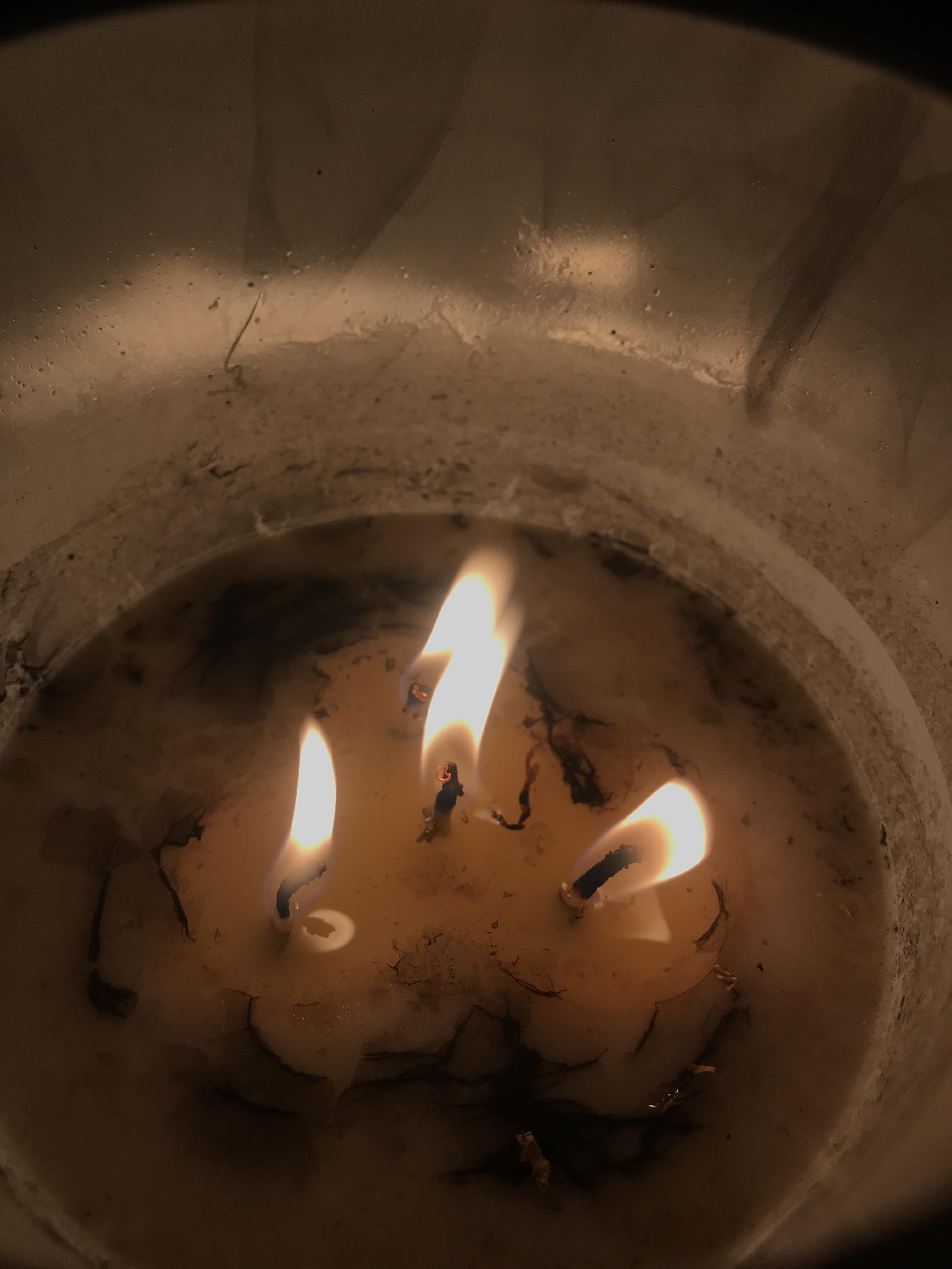 Stuck a weed stem into the wax of my candle, it caught, and has been
