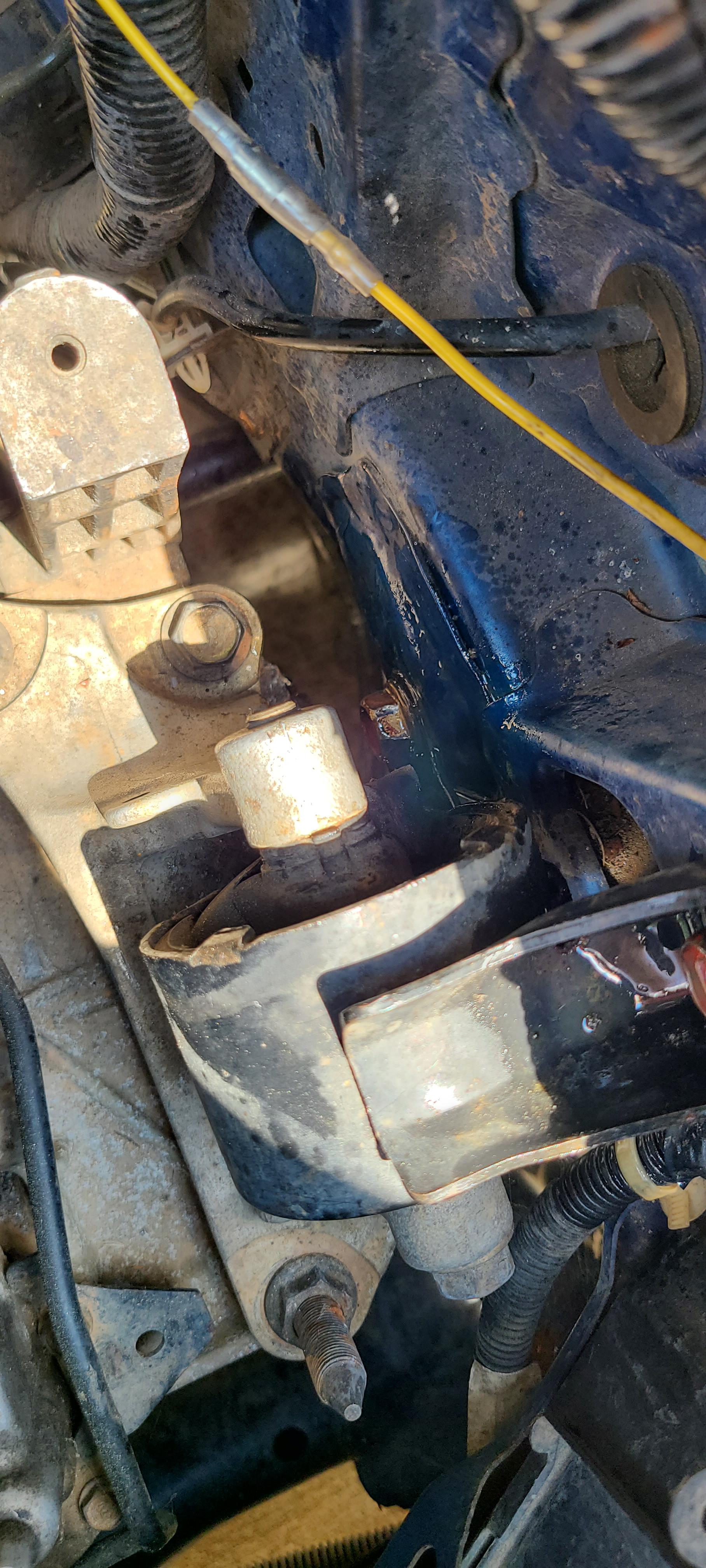 Transmission mount bolt stuck and starting to round any ideas? Can only