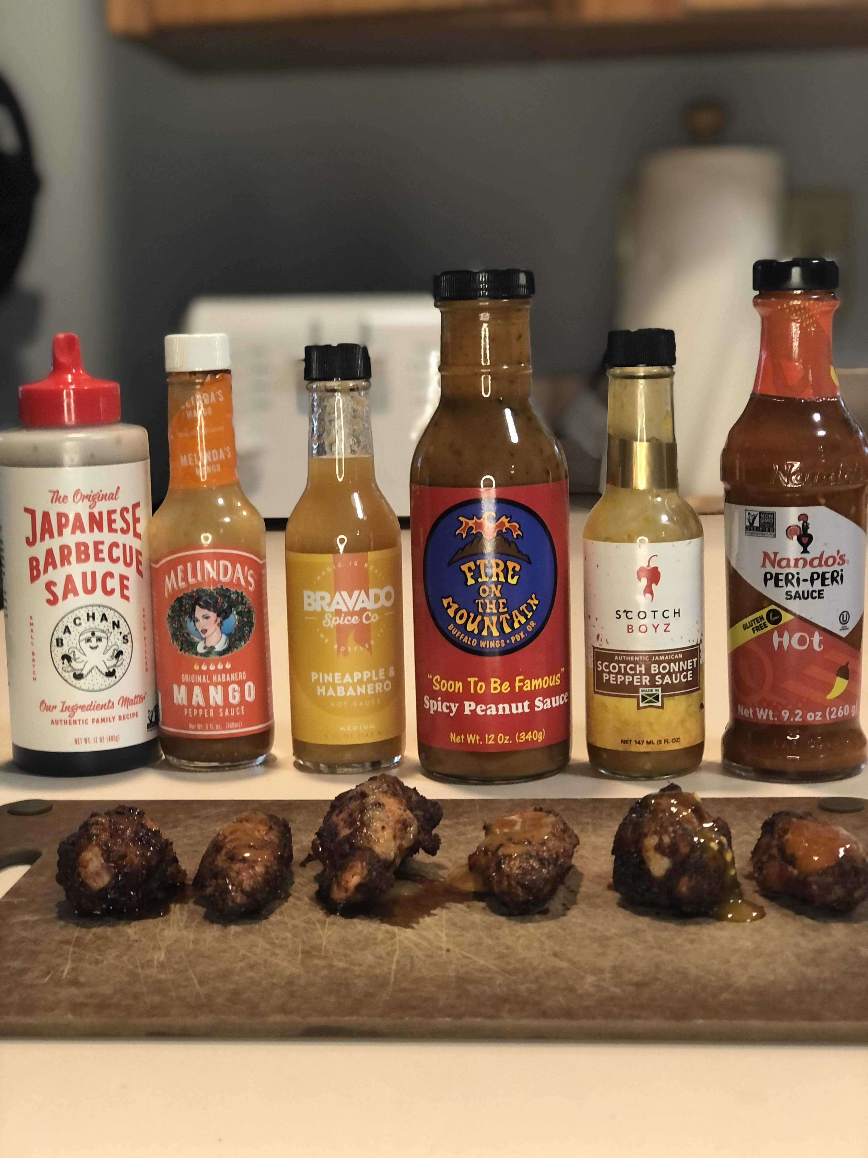 Week 21 Hot Sauce Smoked Wings with a variety of hot sauces a la Hot