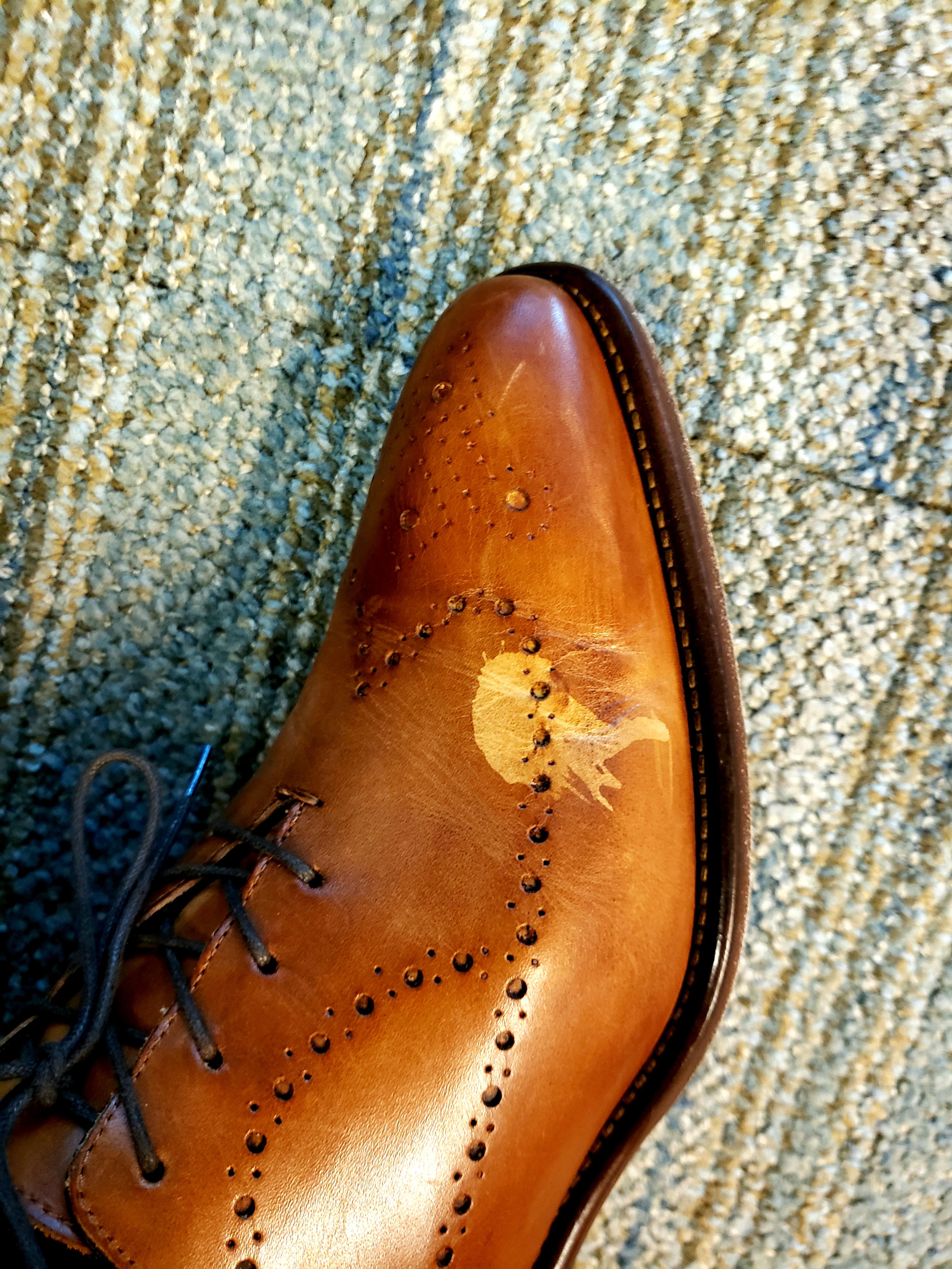Hand sanitizer dripped on to my brand new dress shoes.