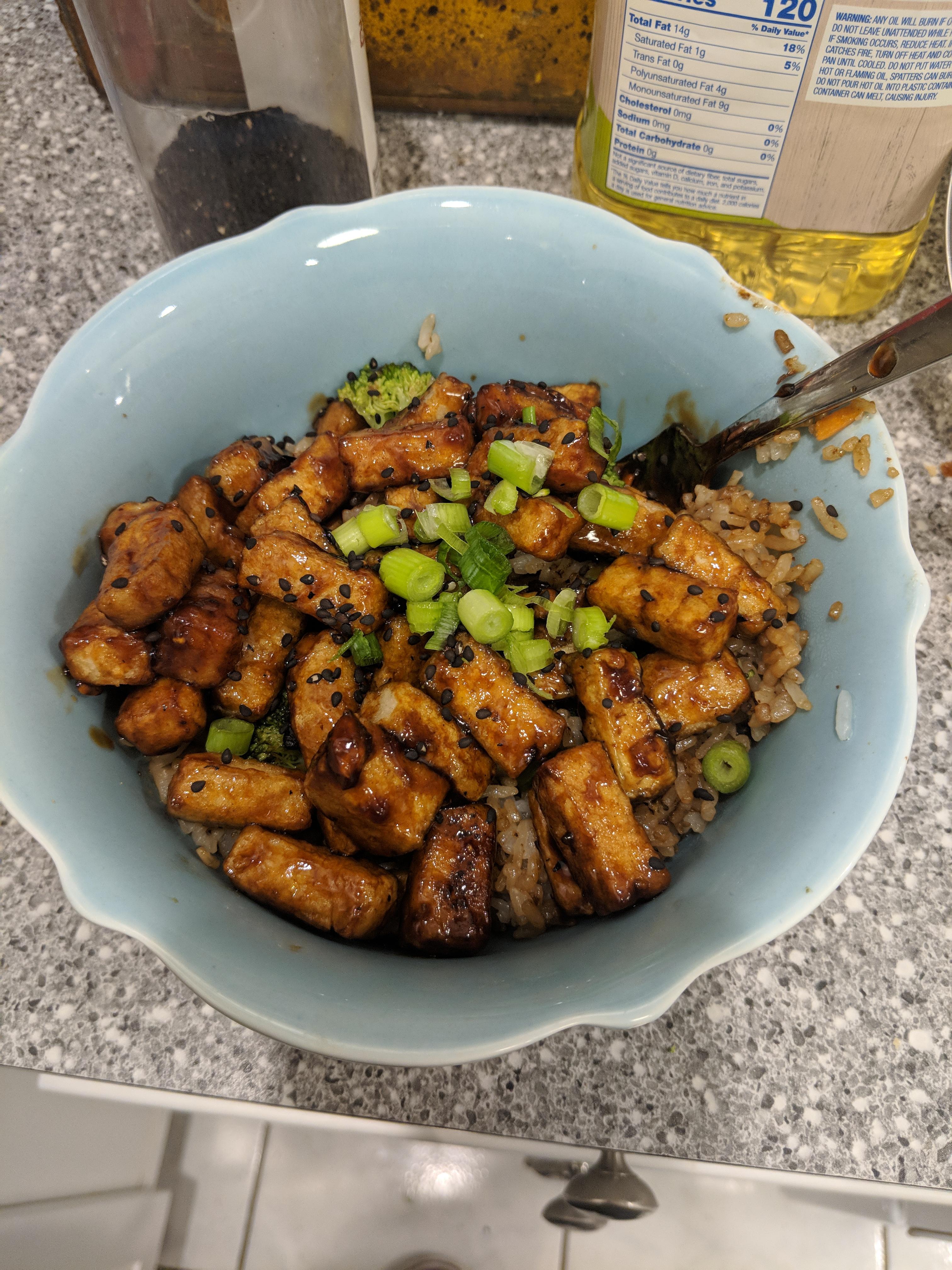 Fried tofu in brown sauce with vegetable fried rice! r/veganrecipes