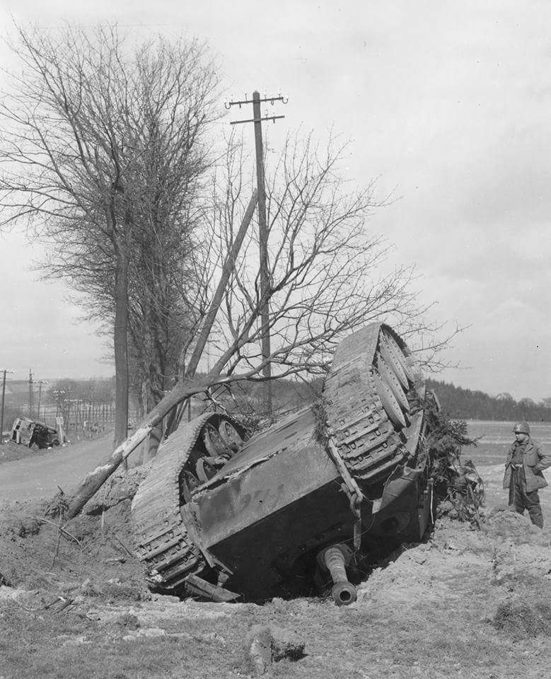 German Jagdpanther tank destroyer flipped over by an aerial bomb, near