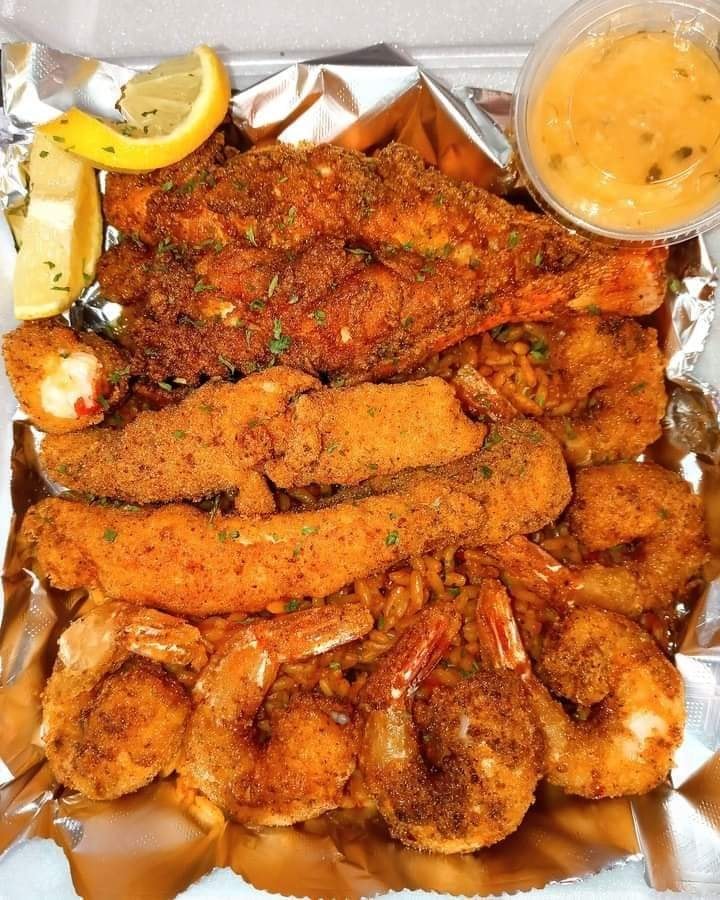 Fried Lobster Tail, Fried King Crab Legs, Fried Jumbo Shrimp on top of