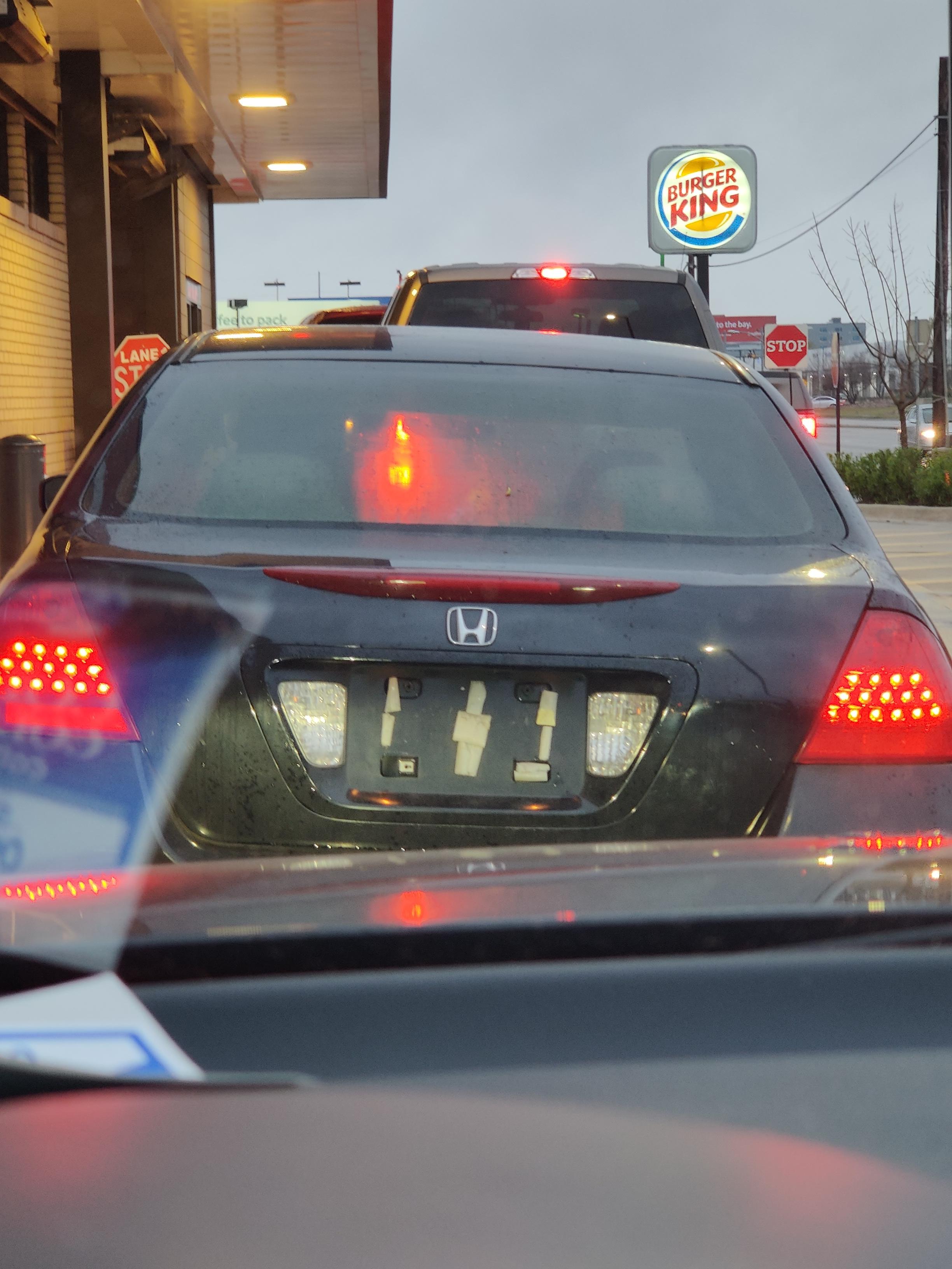 Duct tape should hold my license plate in... r/IdiotsInCars