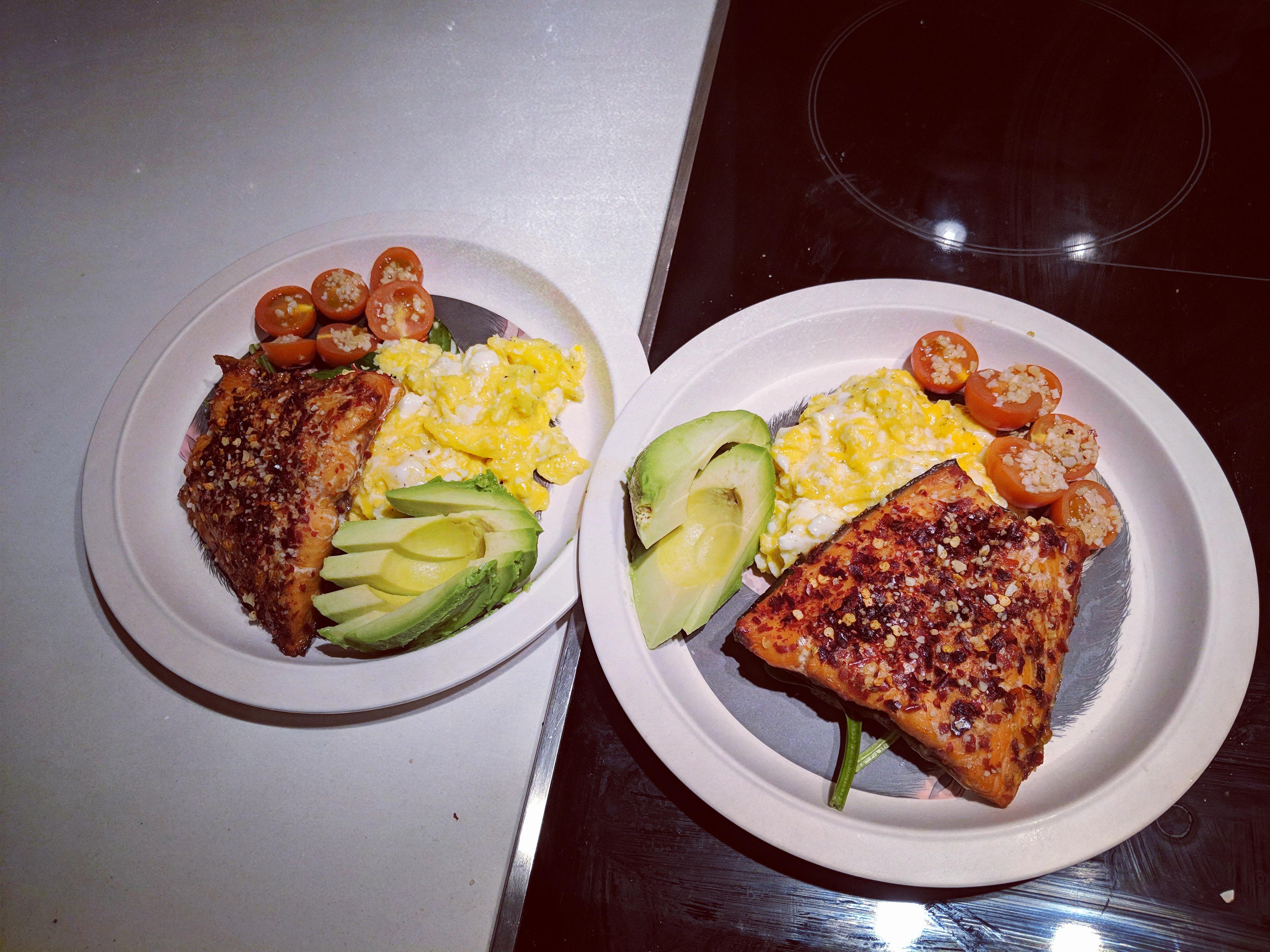 Spicy salmon with scrambled eggs, avocado and tomato 563 calories. Breakfast for dinner the