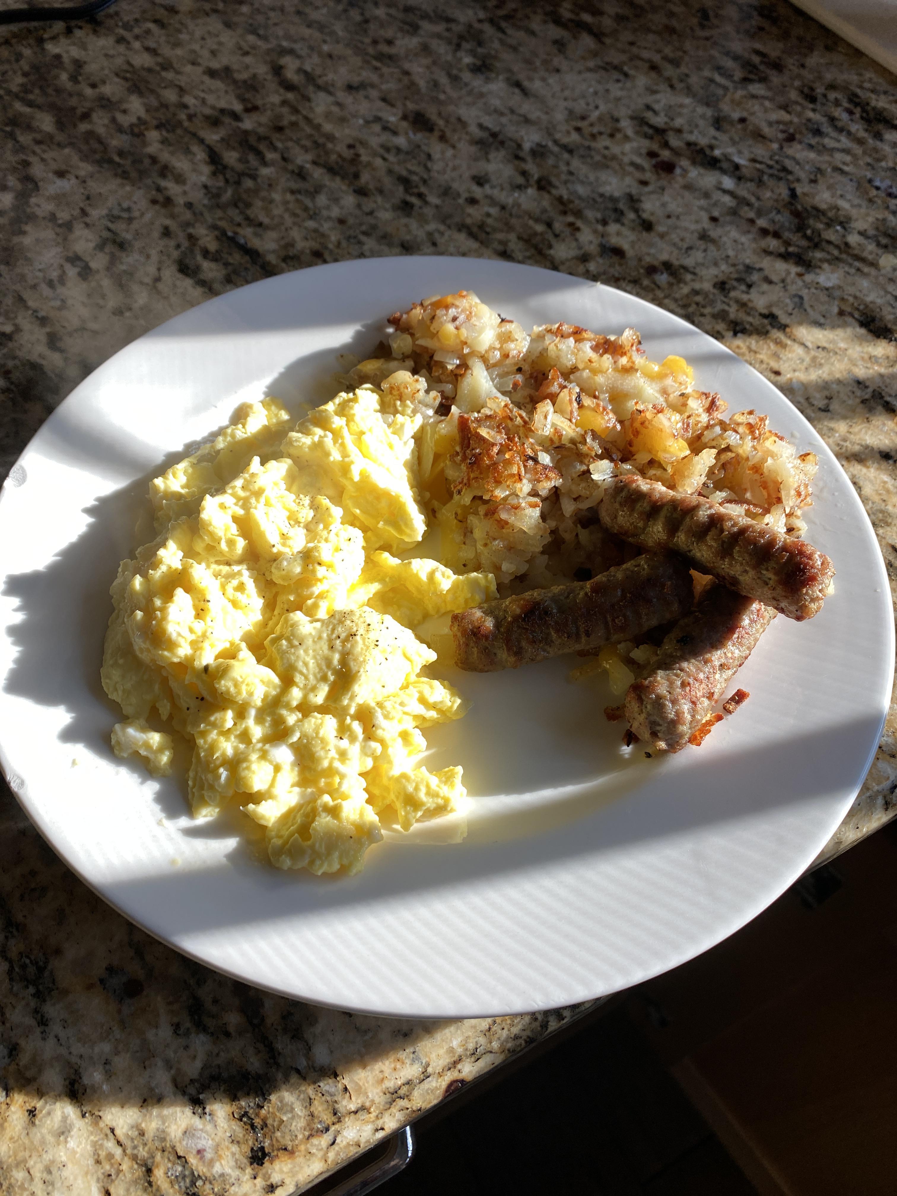 Eggs, turkey sausage, and hash browns with cheese and onions. r