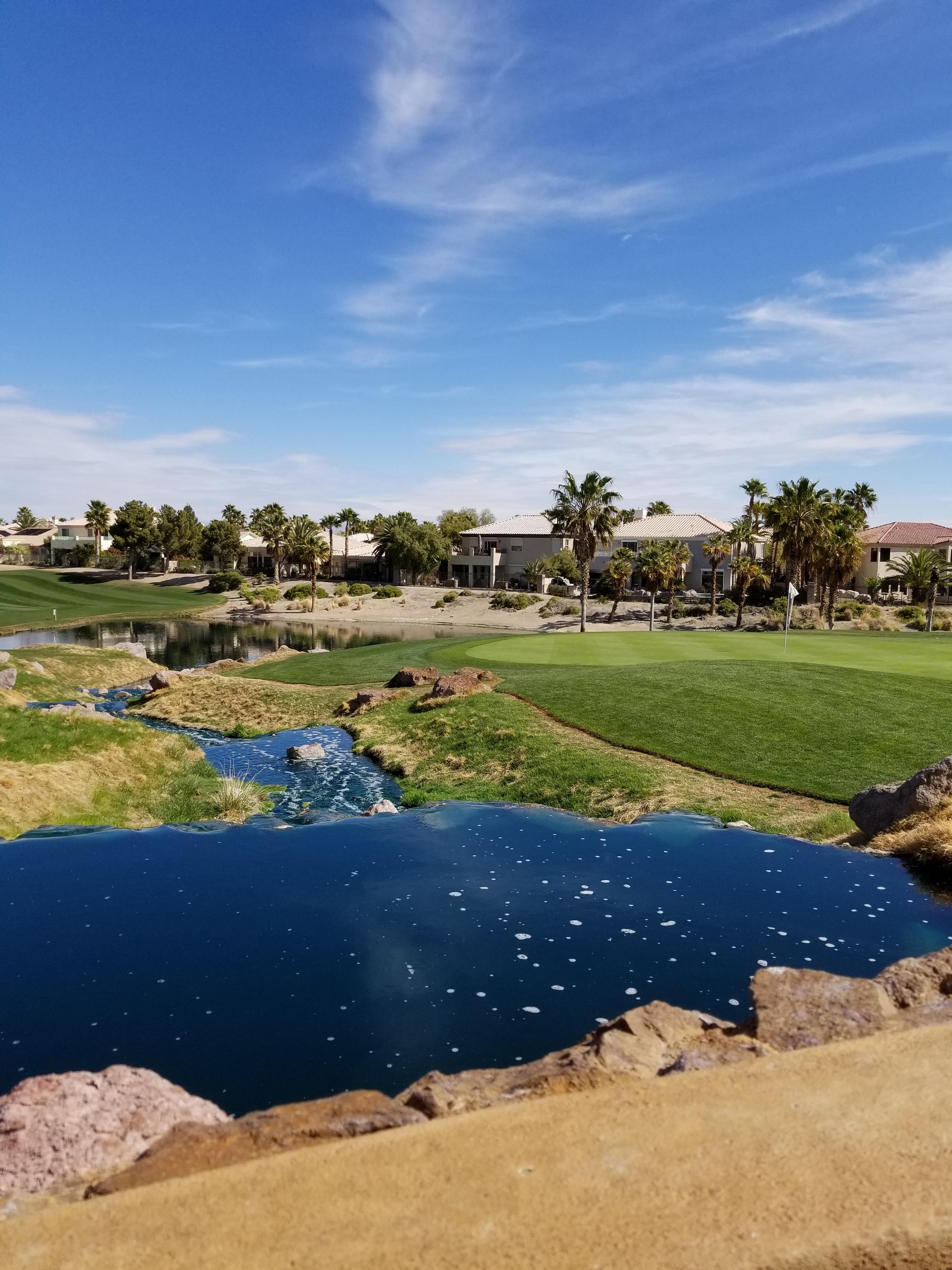 Looking back at the 18th at Rhodes Ranch Golf Club, Las Vegas. r/golf