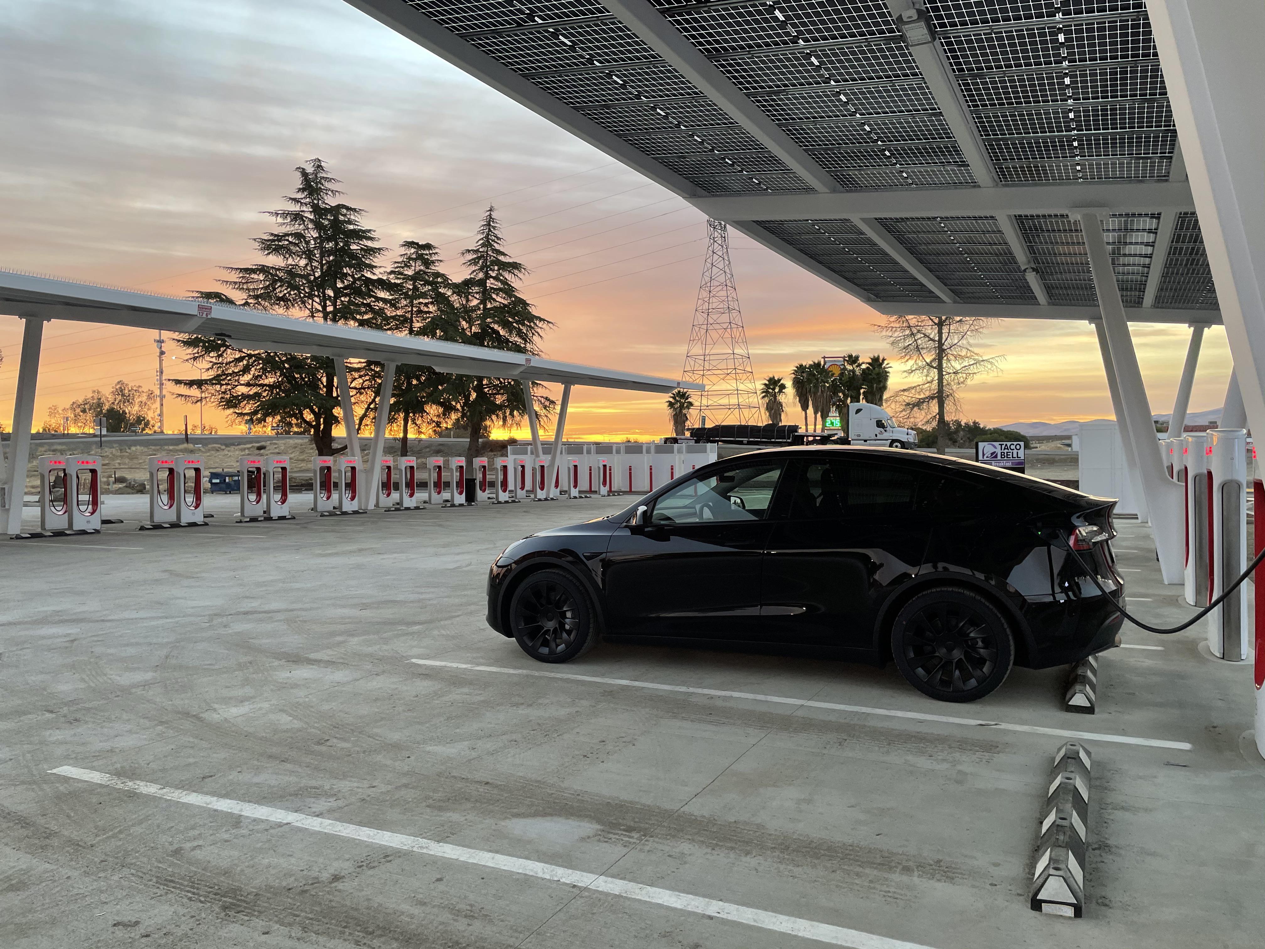 Lonely at the largest Supercharger station in the world (Firebaugh, CA