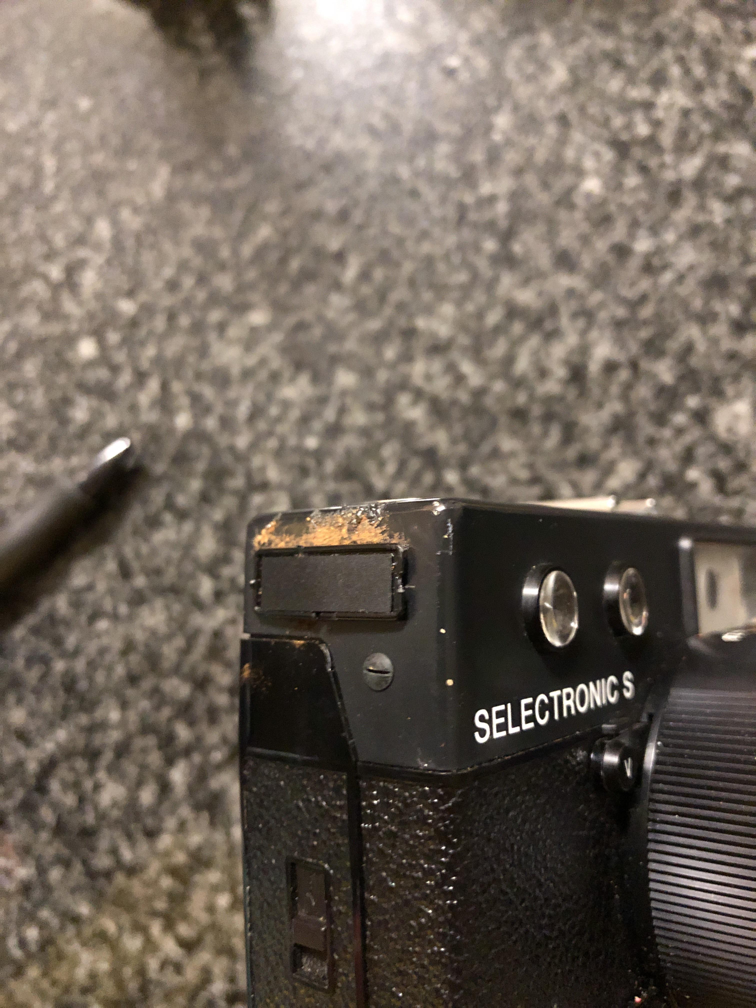 Tips on removing corroded battery? r/vintagecameras