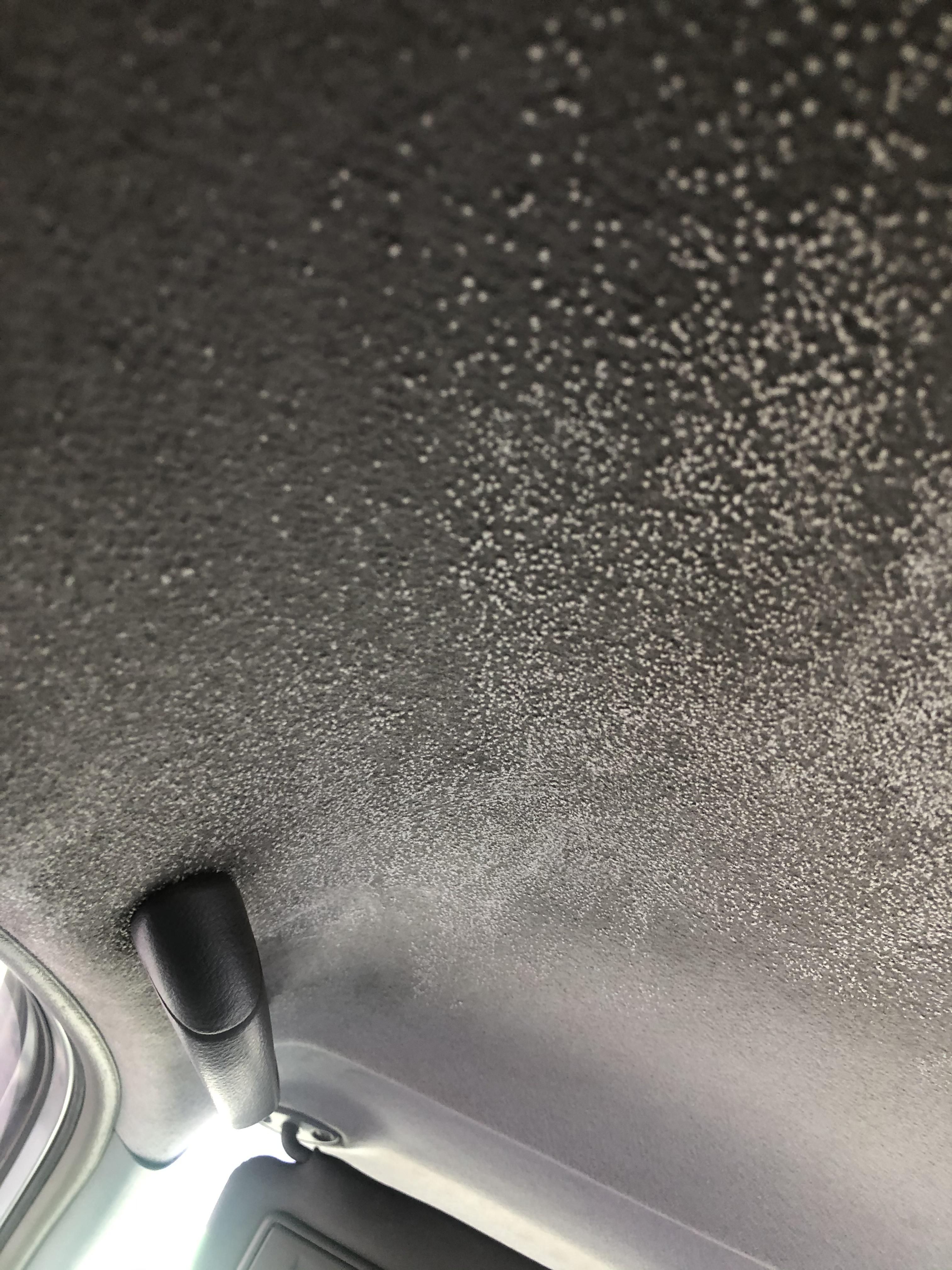 What is powdery substance on ceiling of my car, bought 2nd hand and was kept in a garage for at