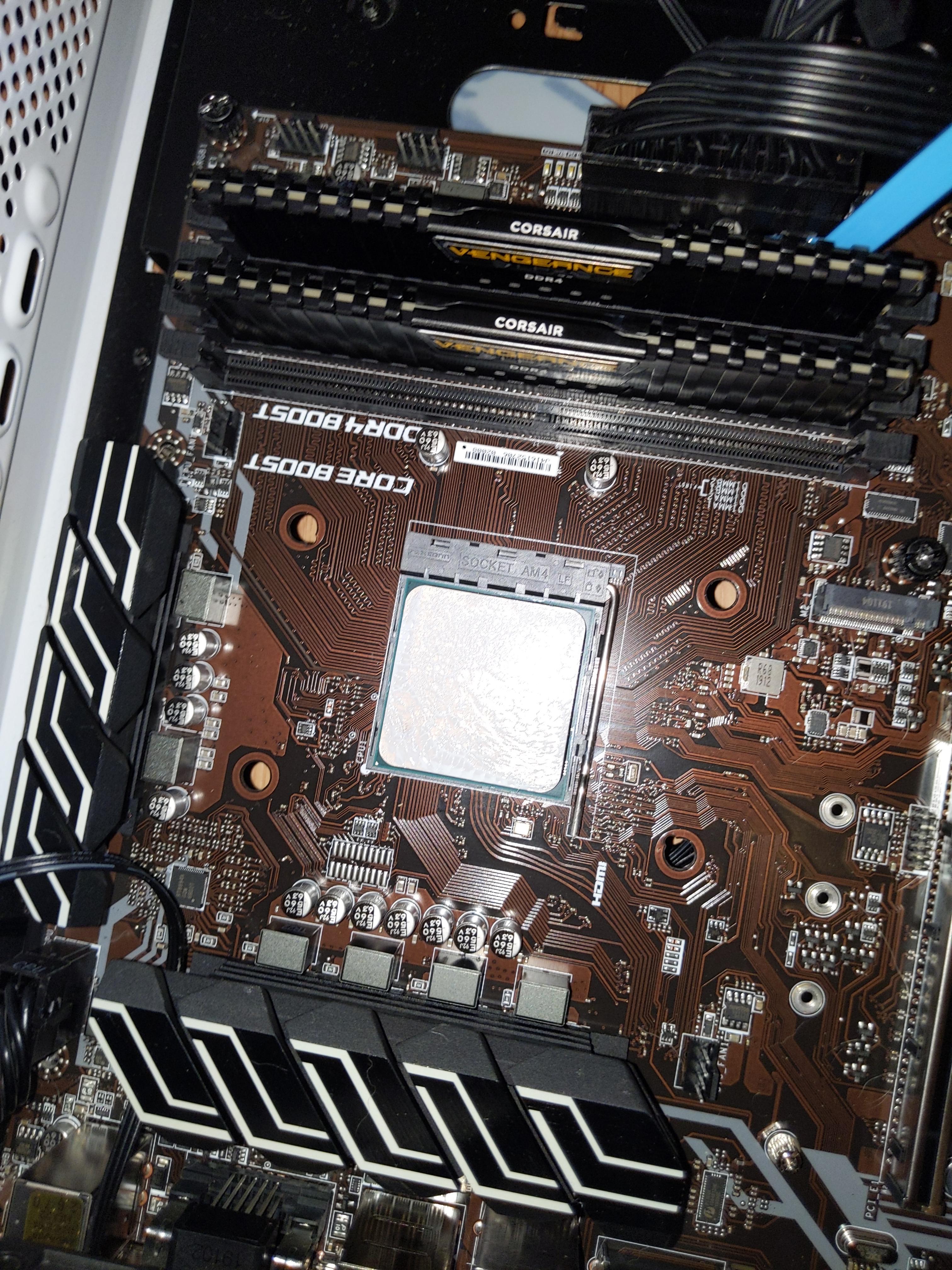 I'm trying to reinstall my CPU cooler but the screws won't connect, is