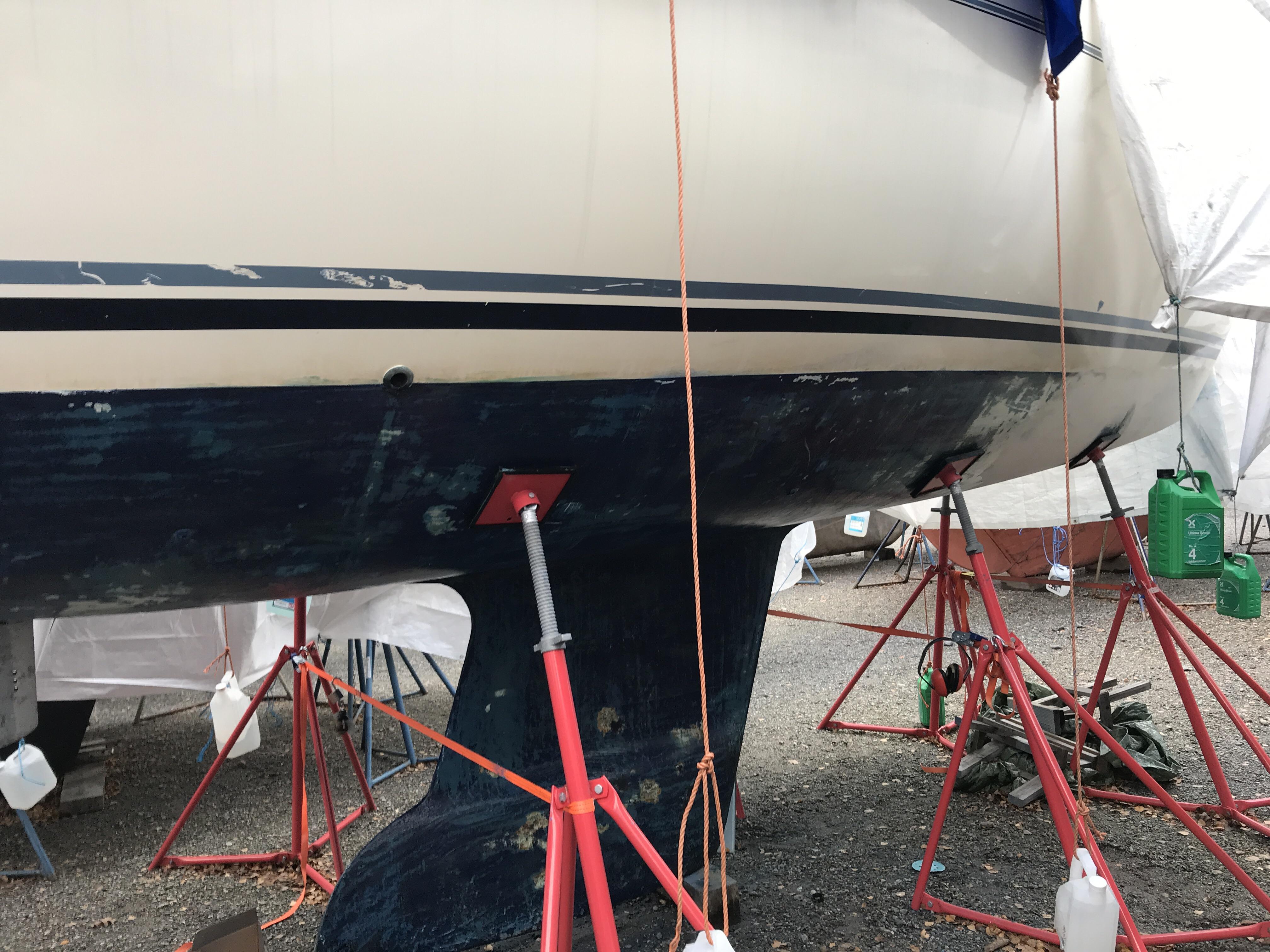 Restoring our hull this winter. 1/4 complete. Kill me now. r/sailing