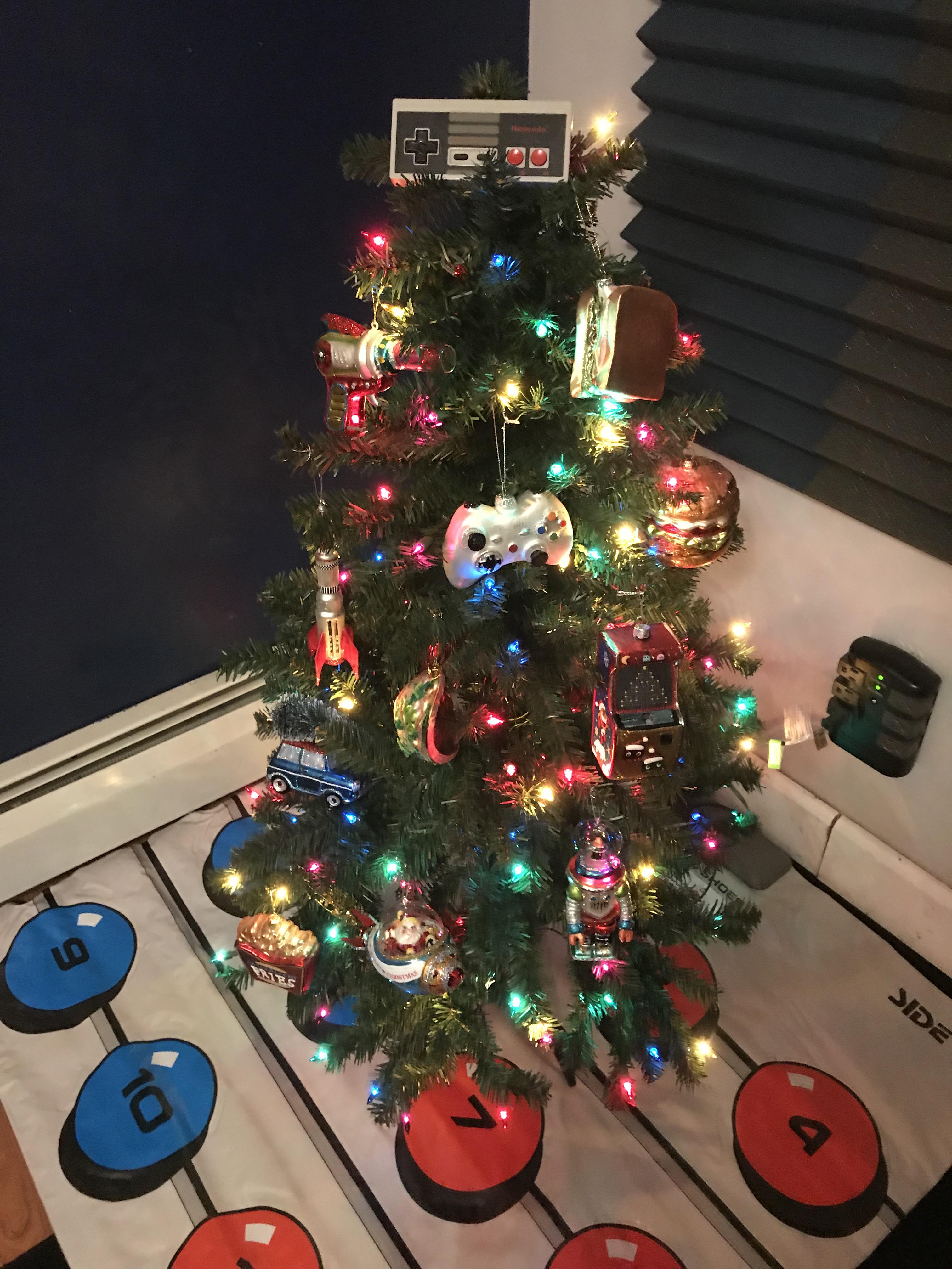 My wife & I didn’t exactly agree on this years Christmas tree theme. So