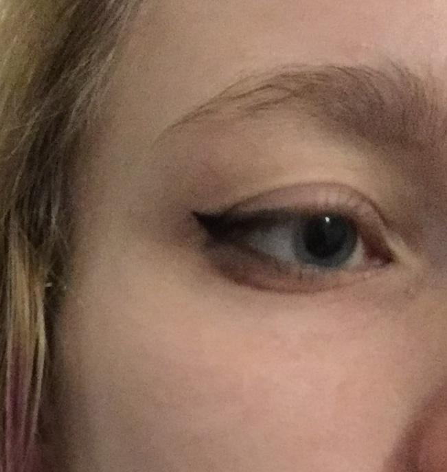 Bad photo but tried doing an eyeliner for the first time! Any critique