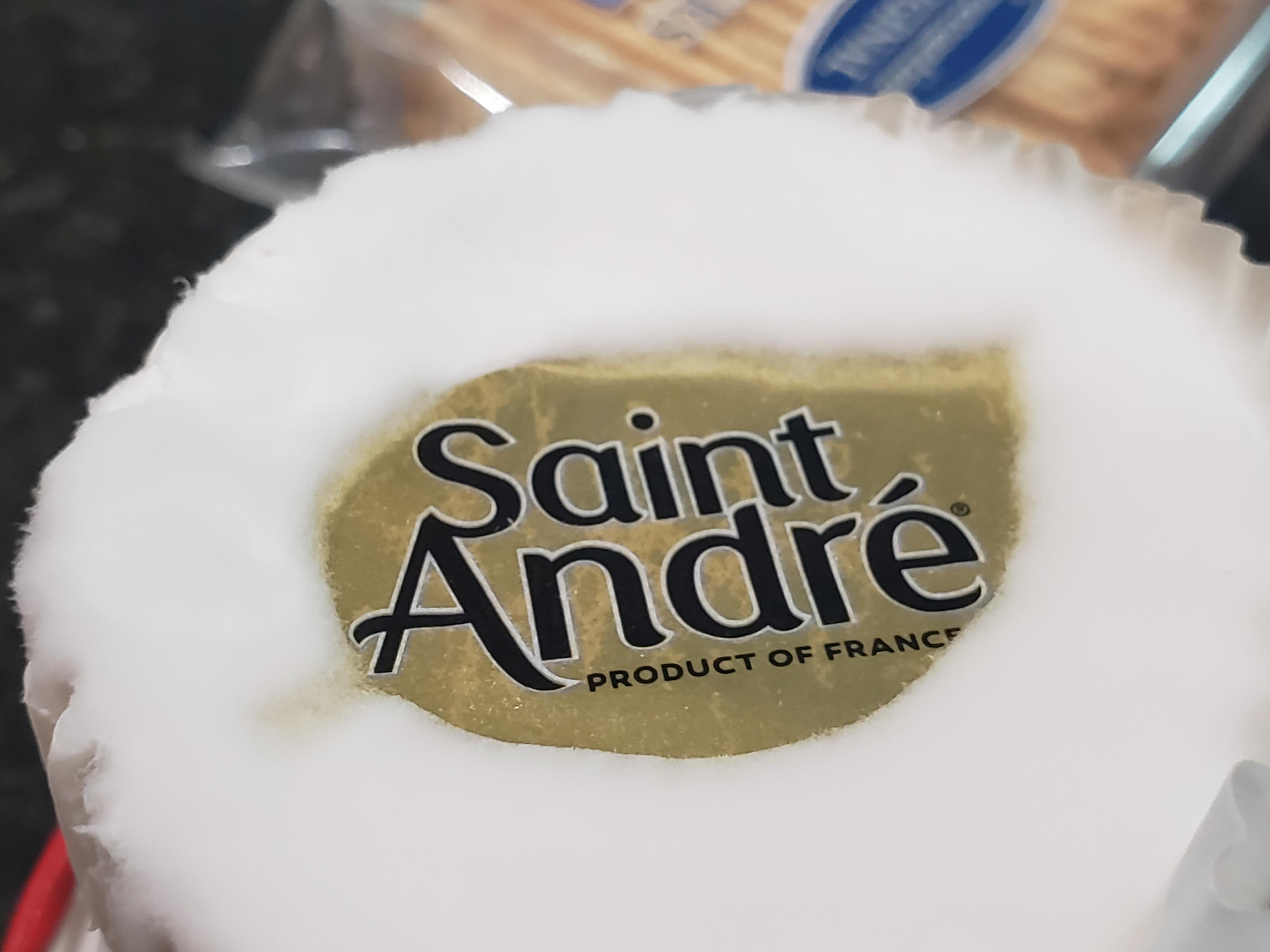 White, fluffy, fuzzy mold all over top of this brie... ok to eat? r