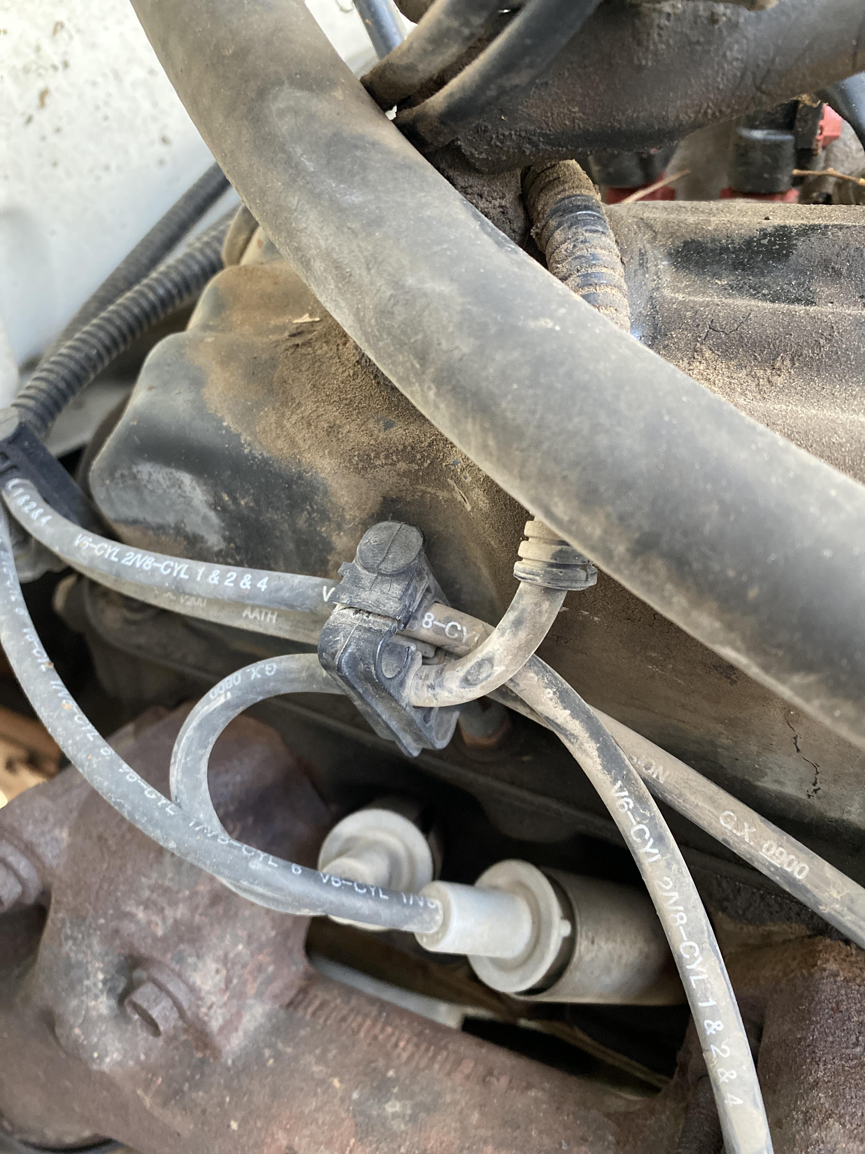 (2001 Dodge Ram 5.9 V8) How do you get these clips holding the spark
