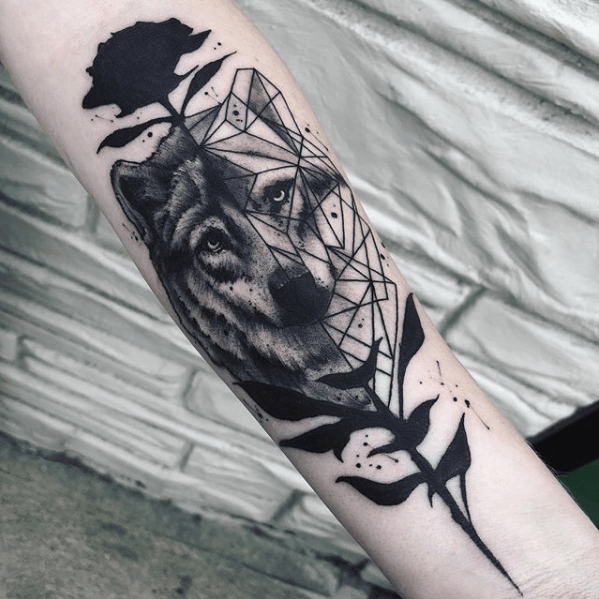 My artist's take on the geometric/photo realistic wolf tattoo. All