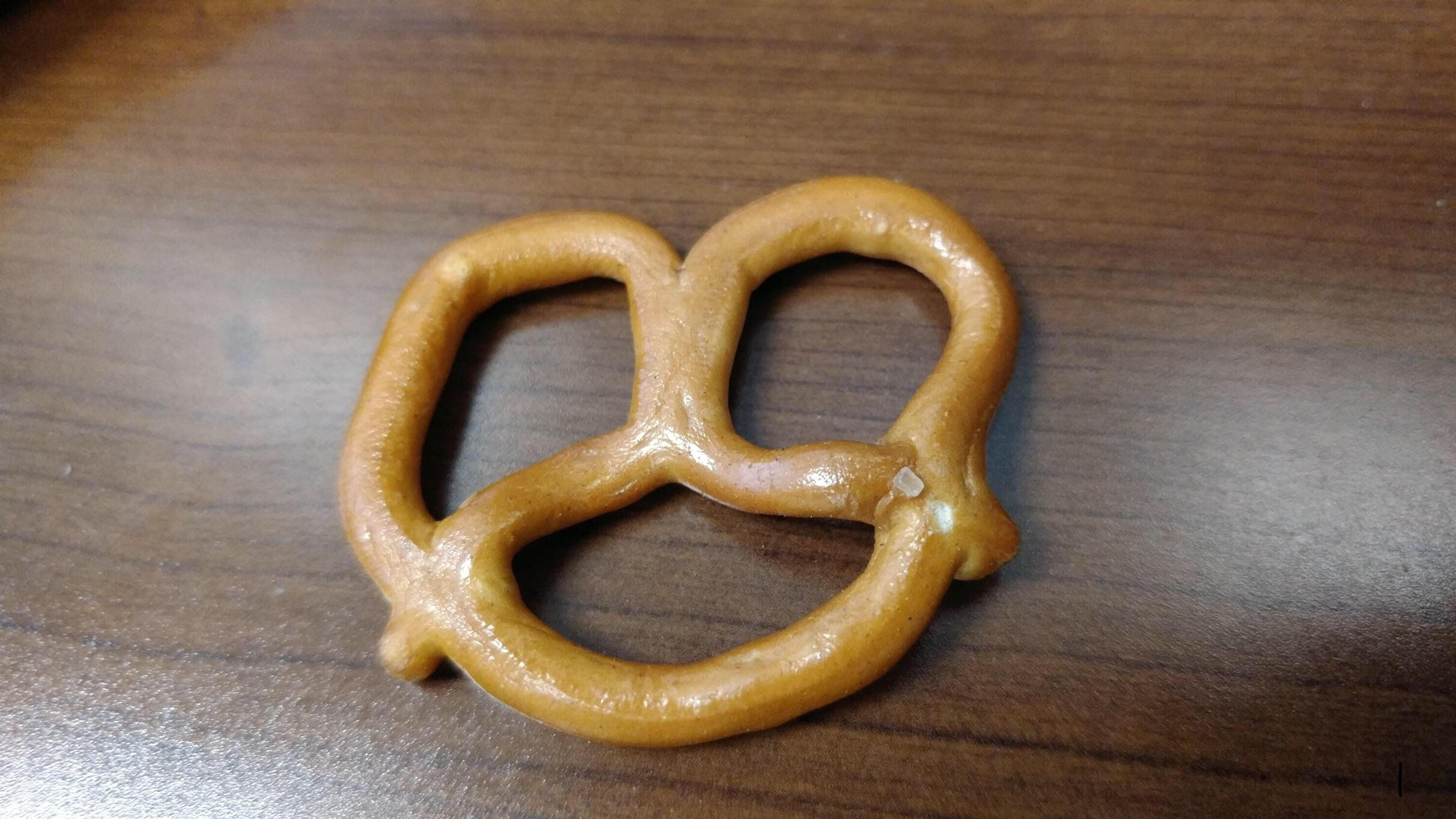 This salted pretzel with only one salt. mildlyinteresting