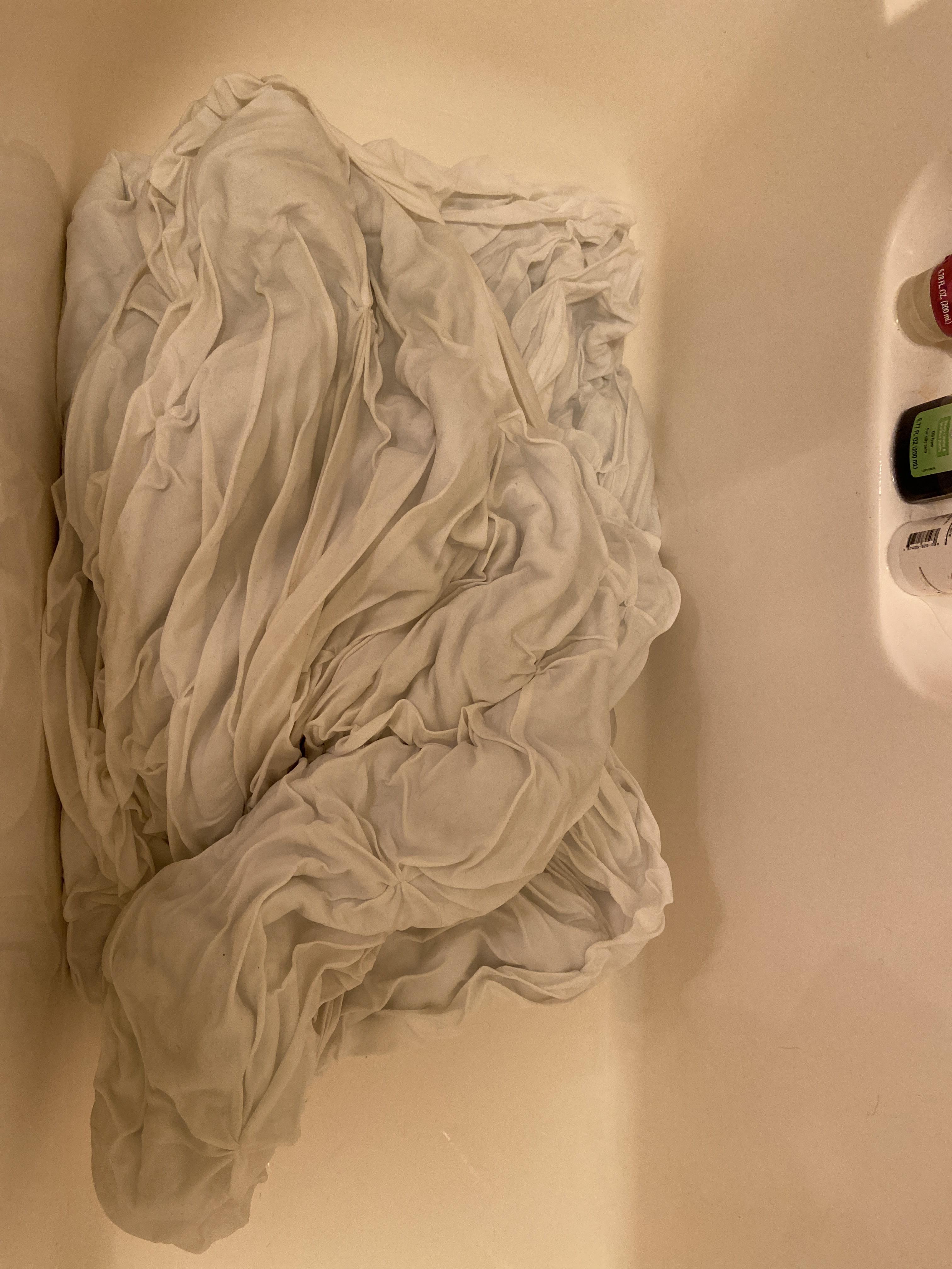 So I decided to wash my comforter in the bathtub and now it’s got all