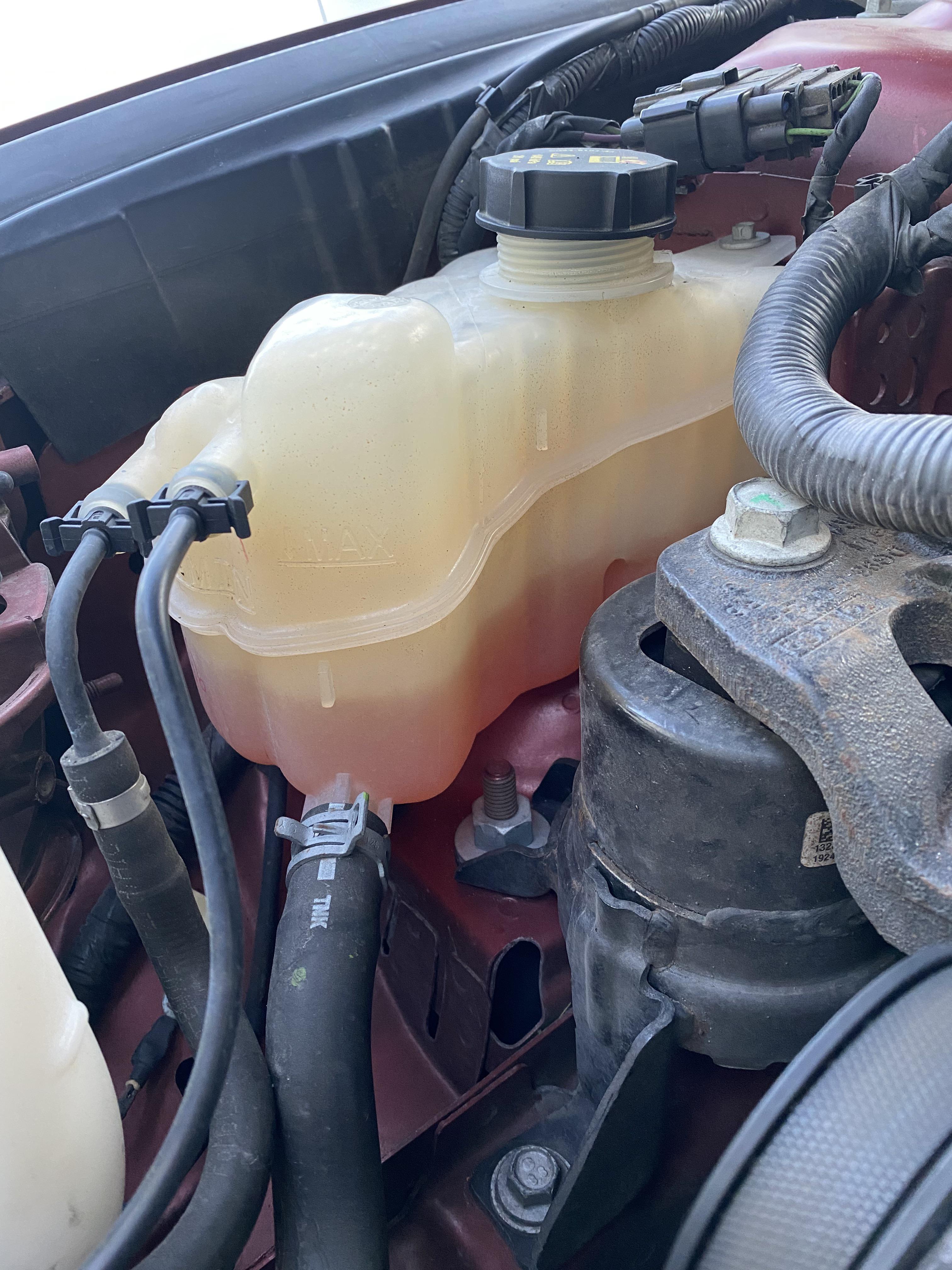 Shop told me coolant level looks fine but looks well below the minimum