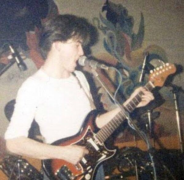 Robert Smith on a Woolworth Top 20 guitar. He recorded most of Three