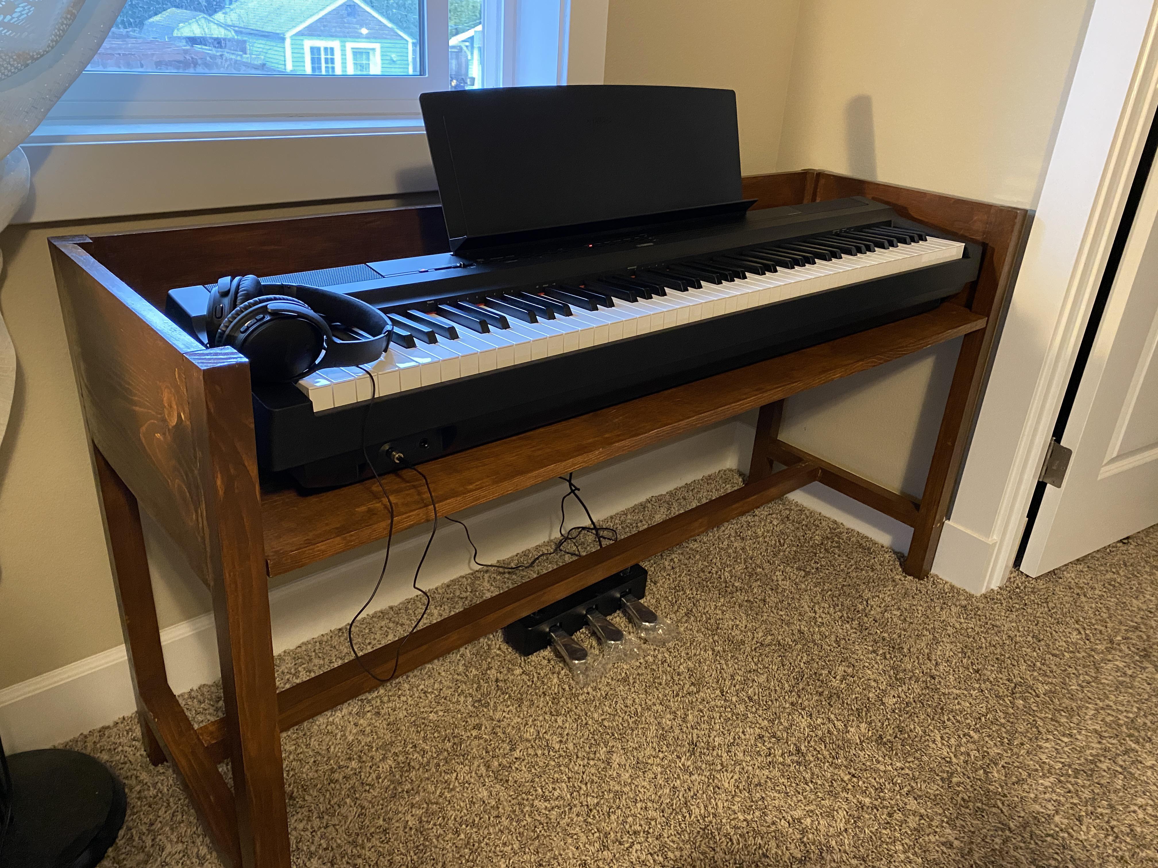 I made a stand for my new Yamaha P125. I have a Samick upright that was my childhood piano but I