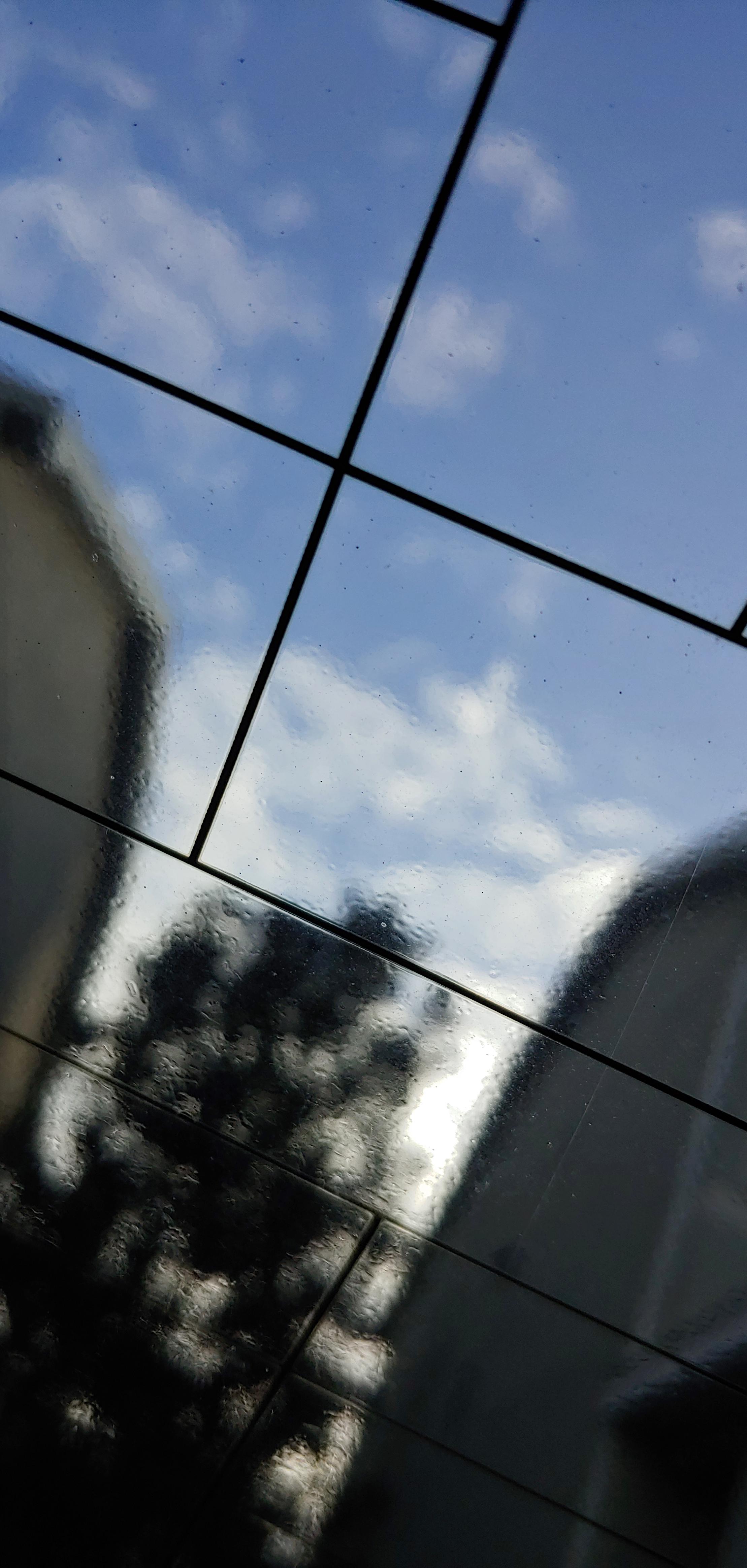 Microbubbles in my rear windshield. What is this? How would I fix it
