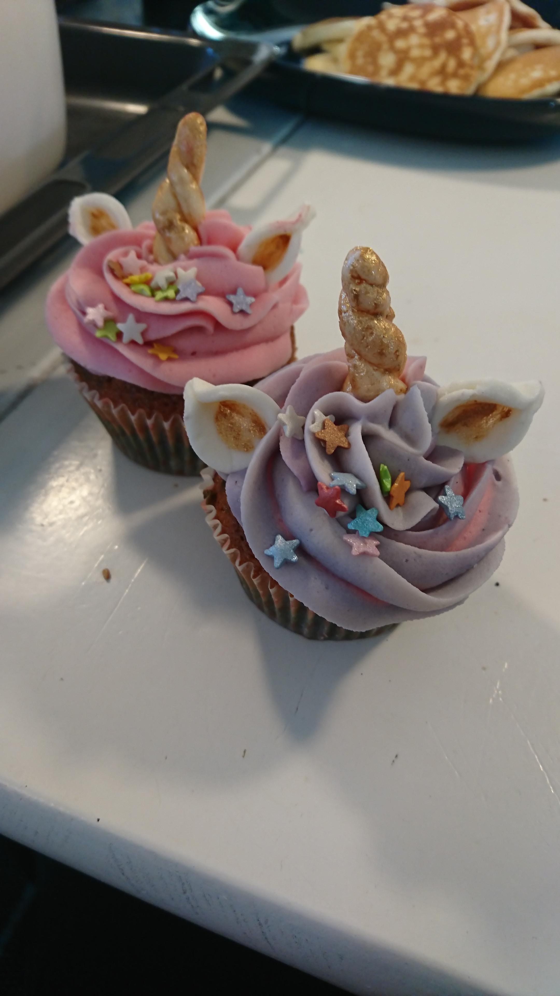 My Sister wanted cupcakes to bring to school, so I made pink and purple