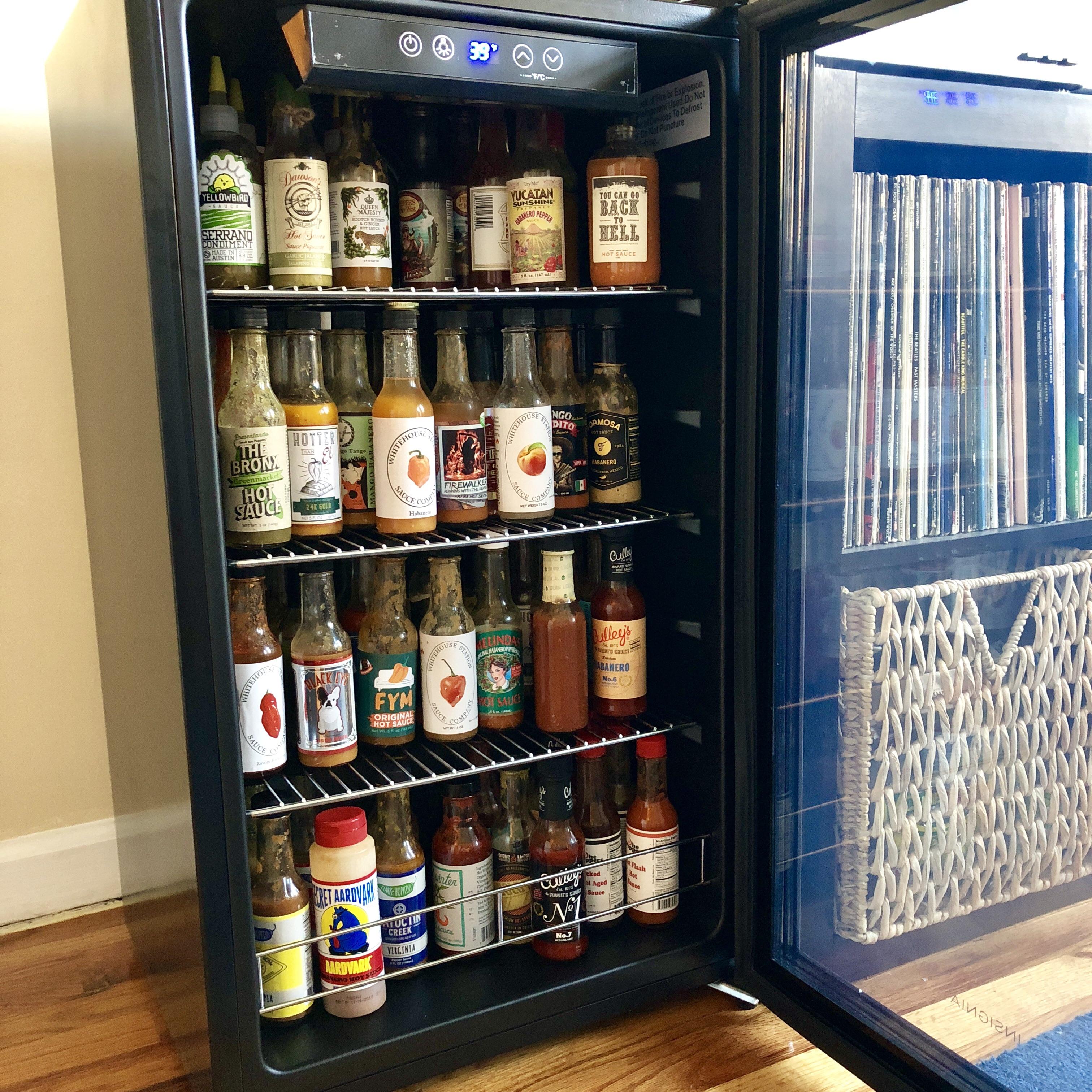 Hit a breaking point...and now we have a hot sauce fridge r/spicy