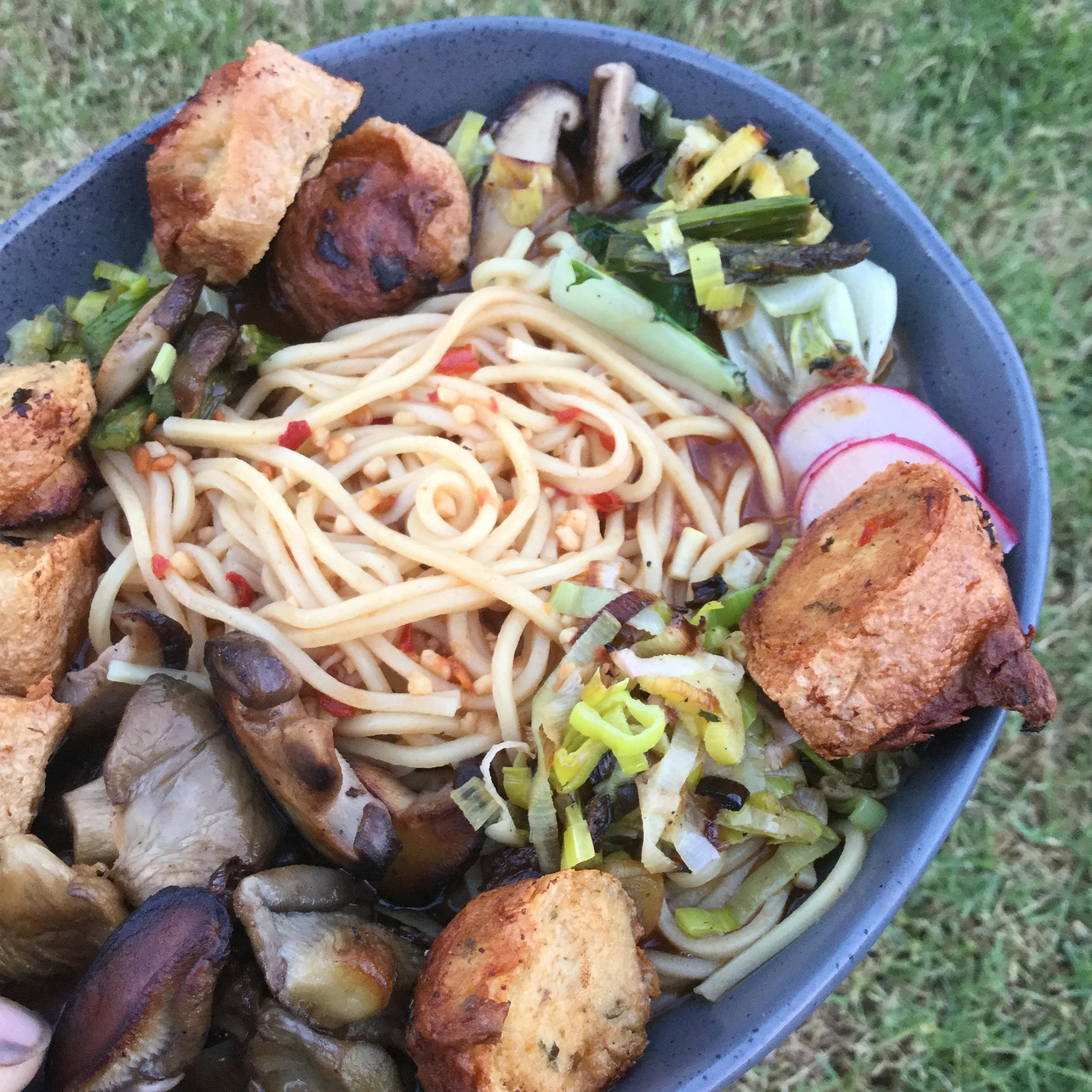 Ramen noodles with mushroom, leek, asparagus in a delicate vegetable