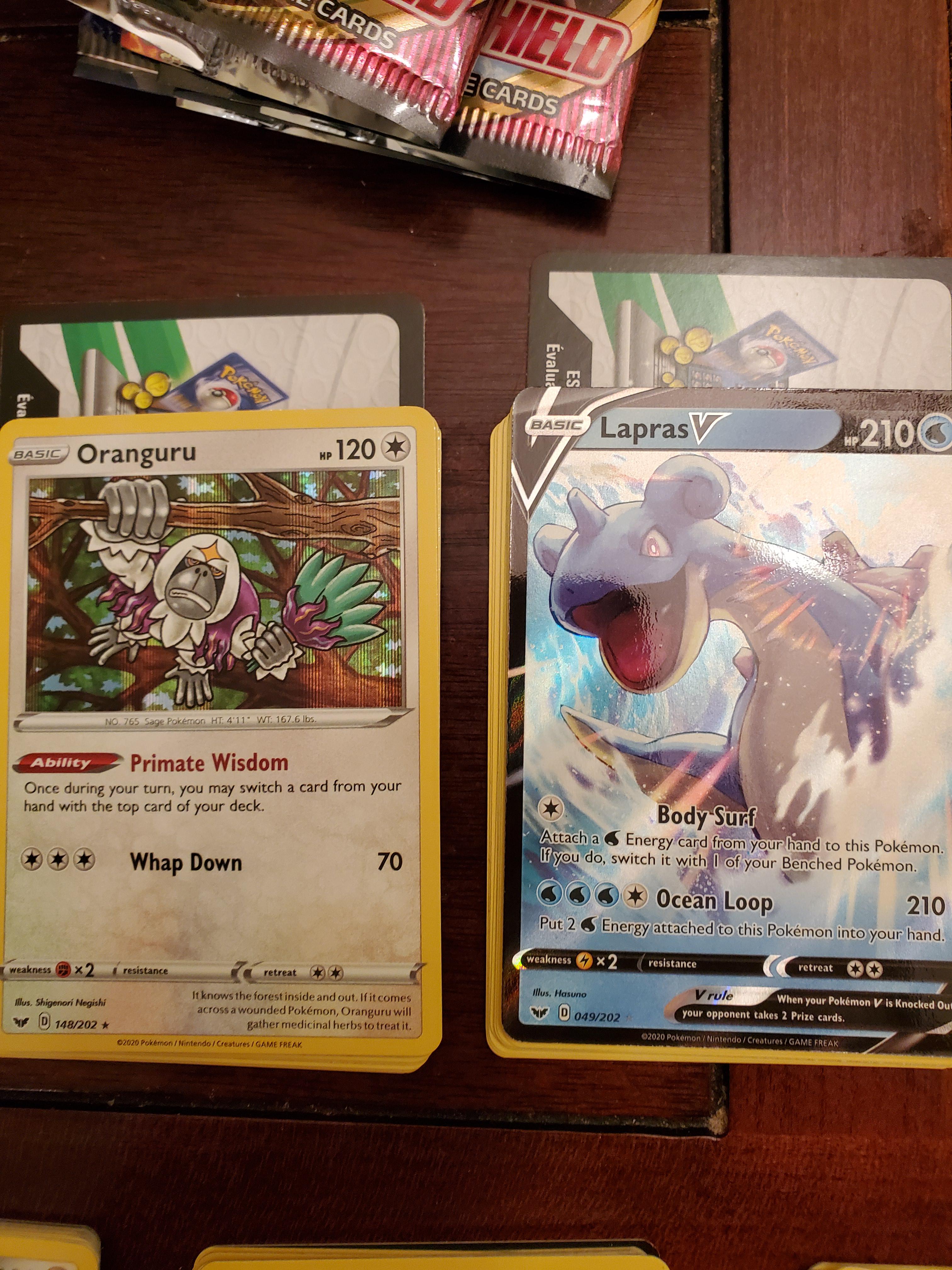 Got an ETB. My *only* two white code cards ( r/PokemonTCG