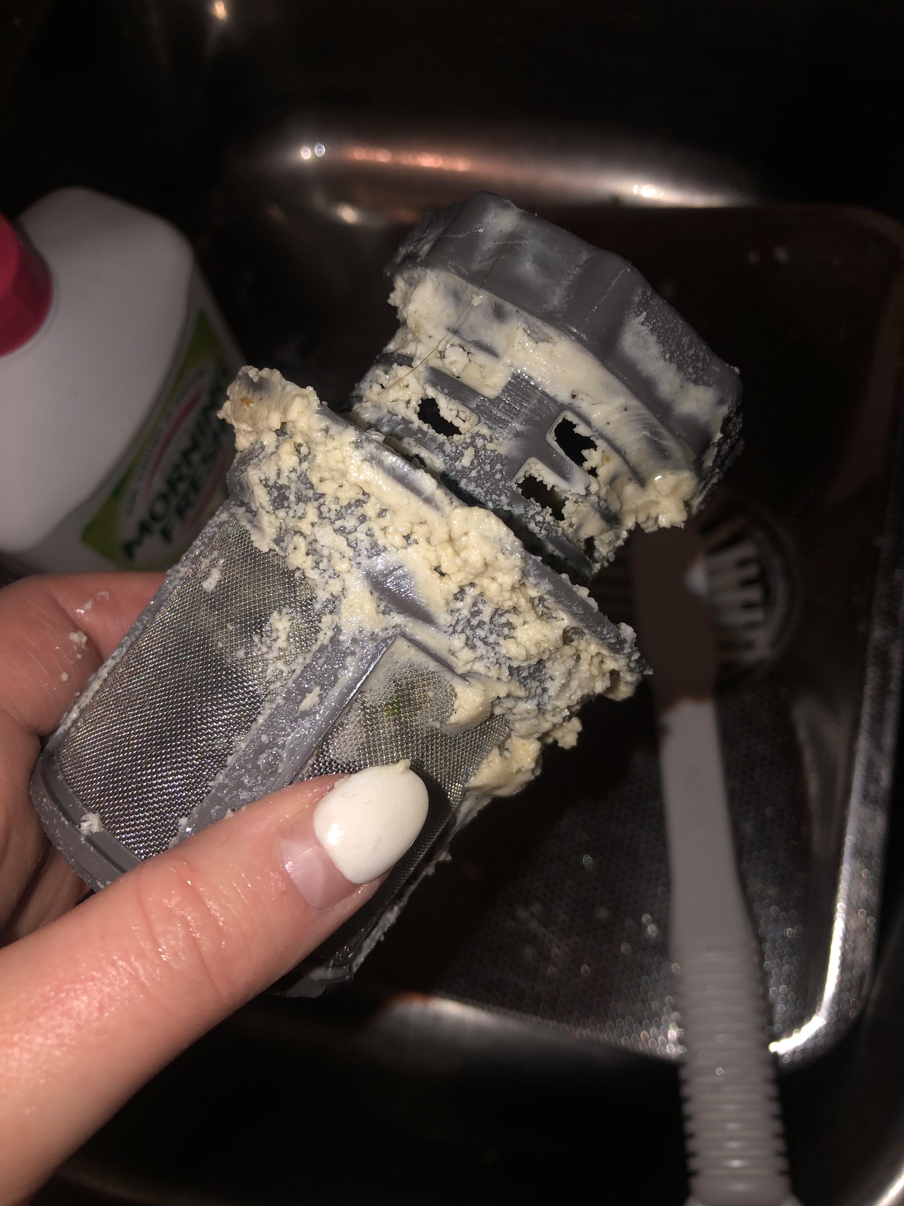 There is a strange oily/butter type substance growing in my dishwasher