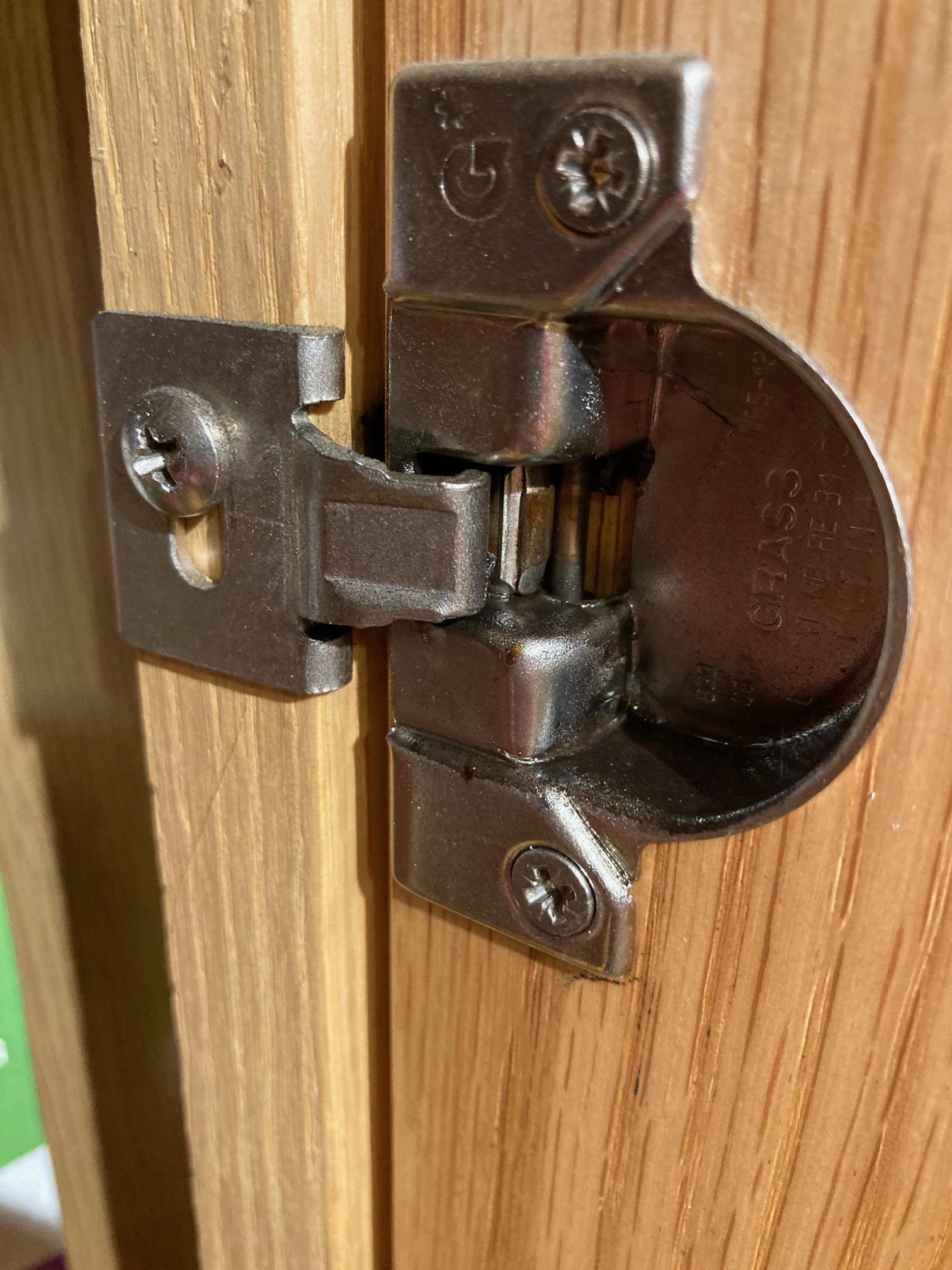 How do I adjust this Grass hinge? door floats open about 2