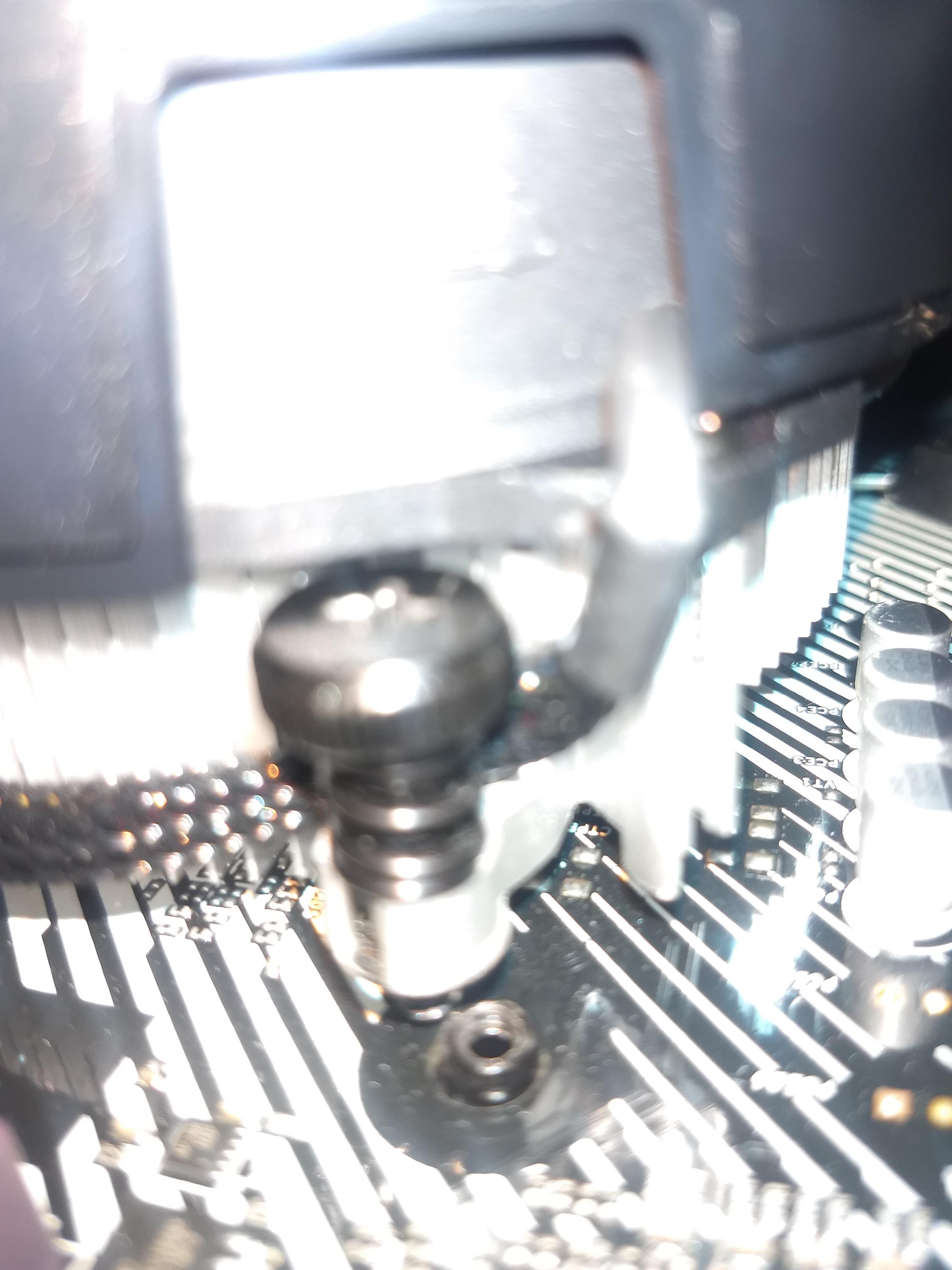 My CPU cooler won't line up. I have all the other screws lined up but