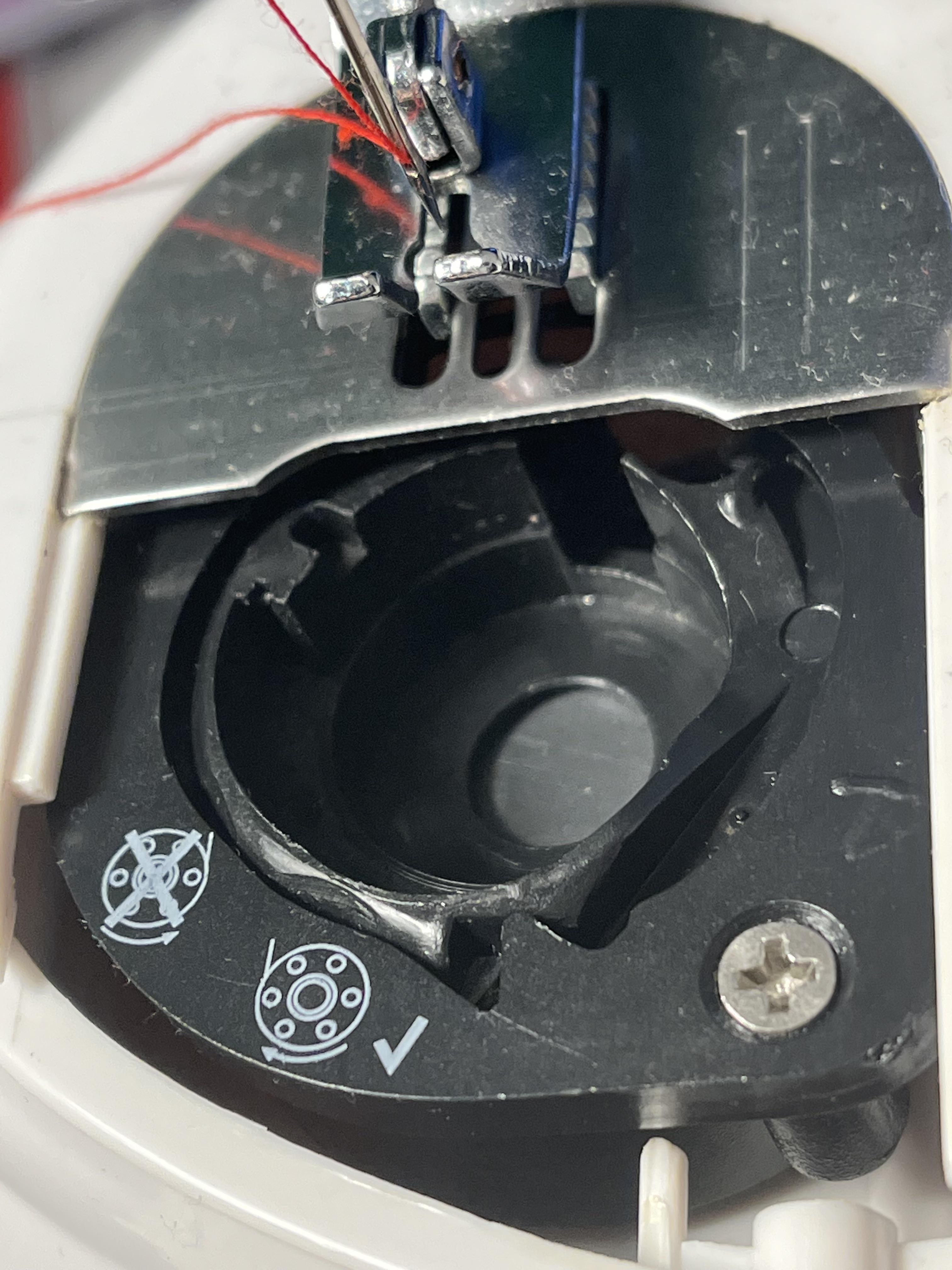 does anyone know how to thread this type of bobbin compartment? r/sewing