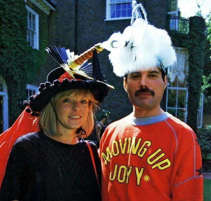 Freddie Mercury with his lifetime friend Mary Austin, 1980s. r/queen