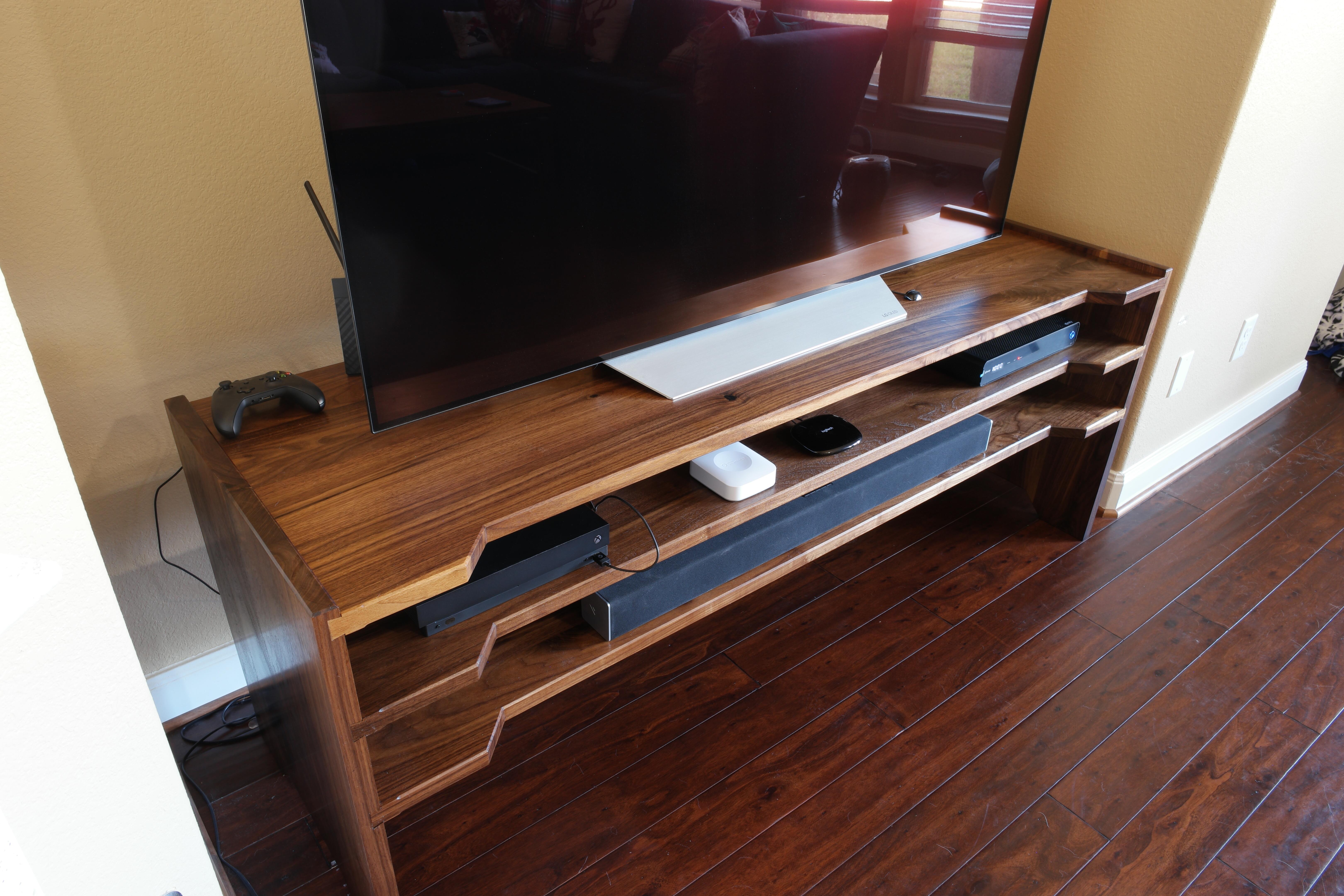 Finally finished a stand for the TV! Made out of solid walnut. Dimensions 72"x24"x28" r