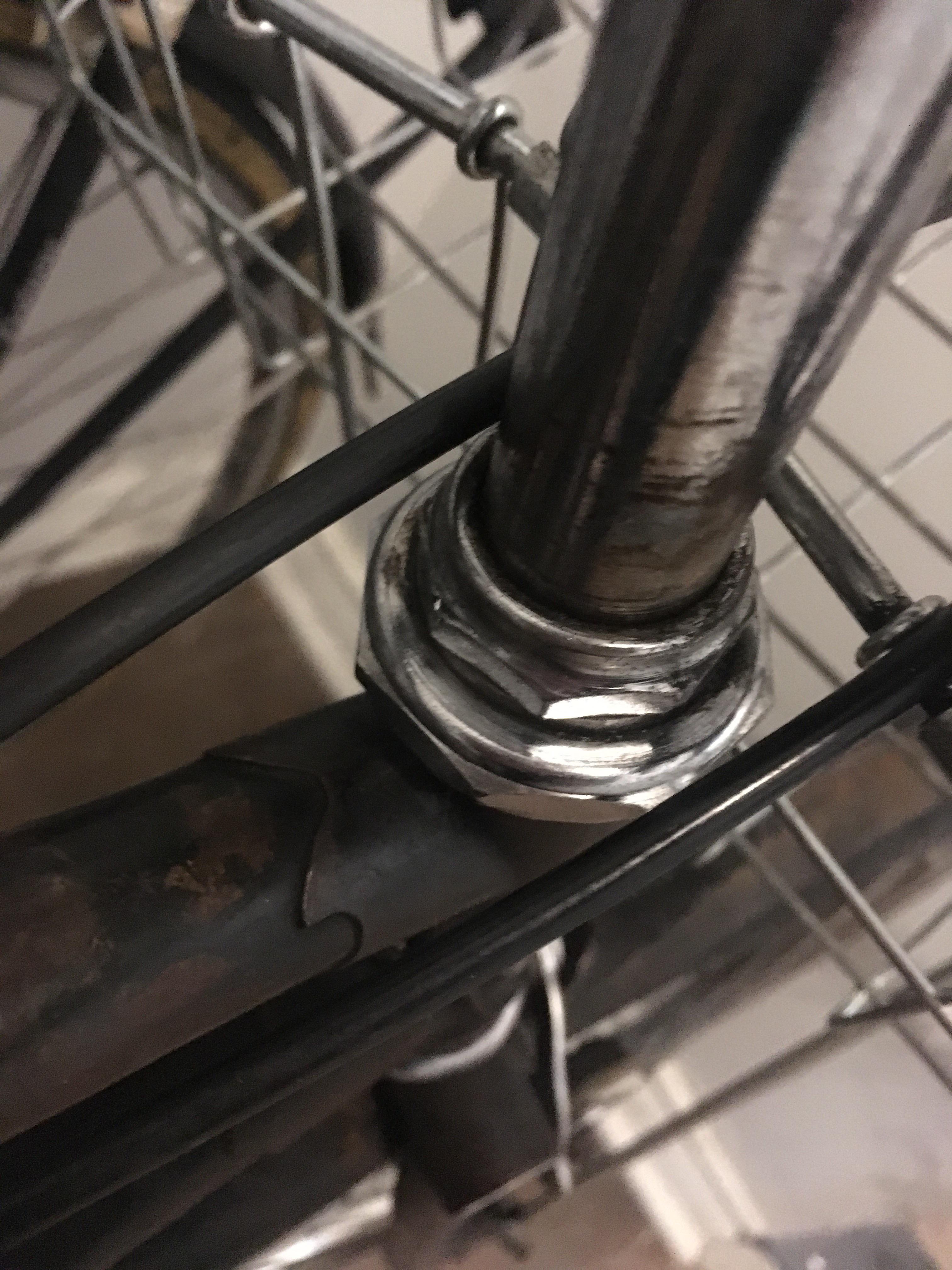 This top nut on the headset of my Raleigh 3 speed seems to be stripped