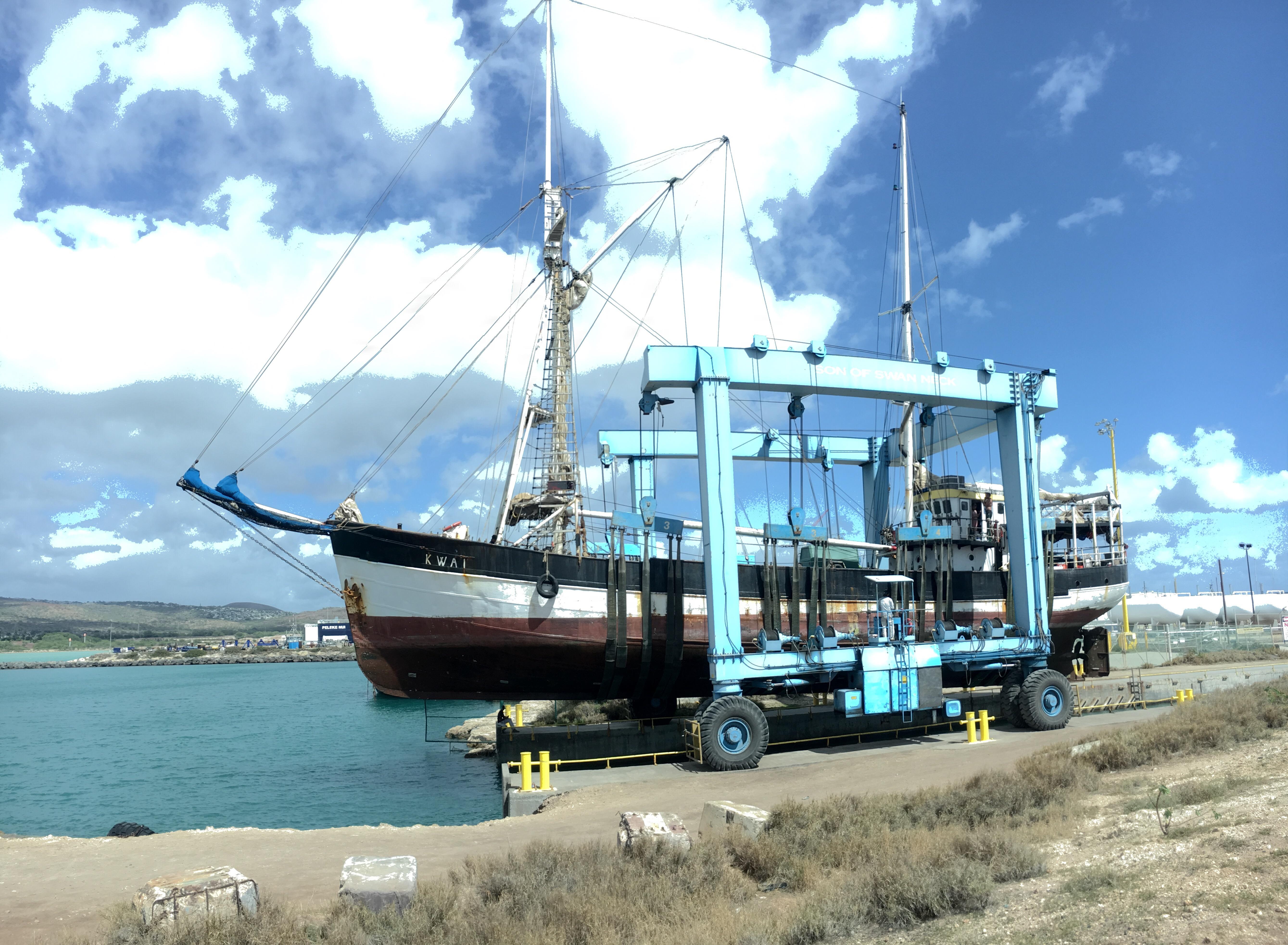 Sailing vessel, Kwai being pulled out on Oahu, Hawaii today. r/sailing