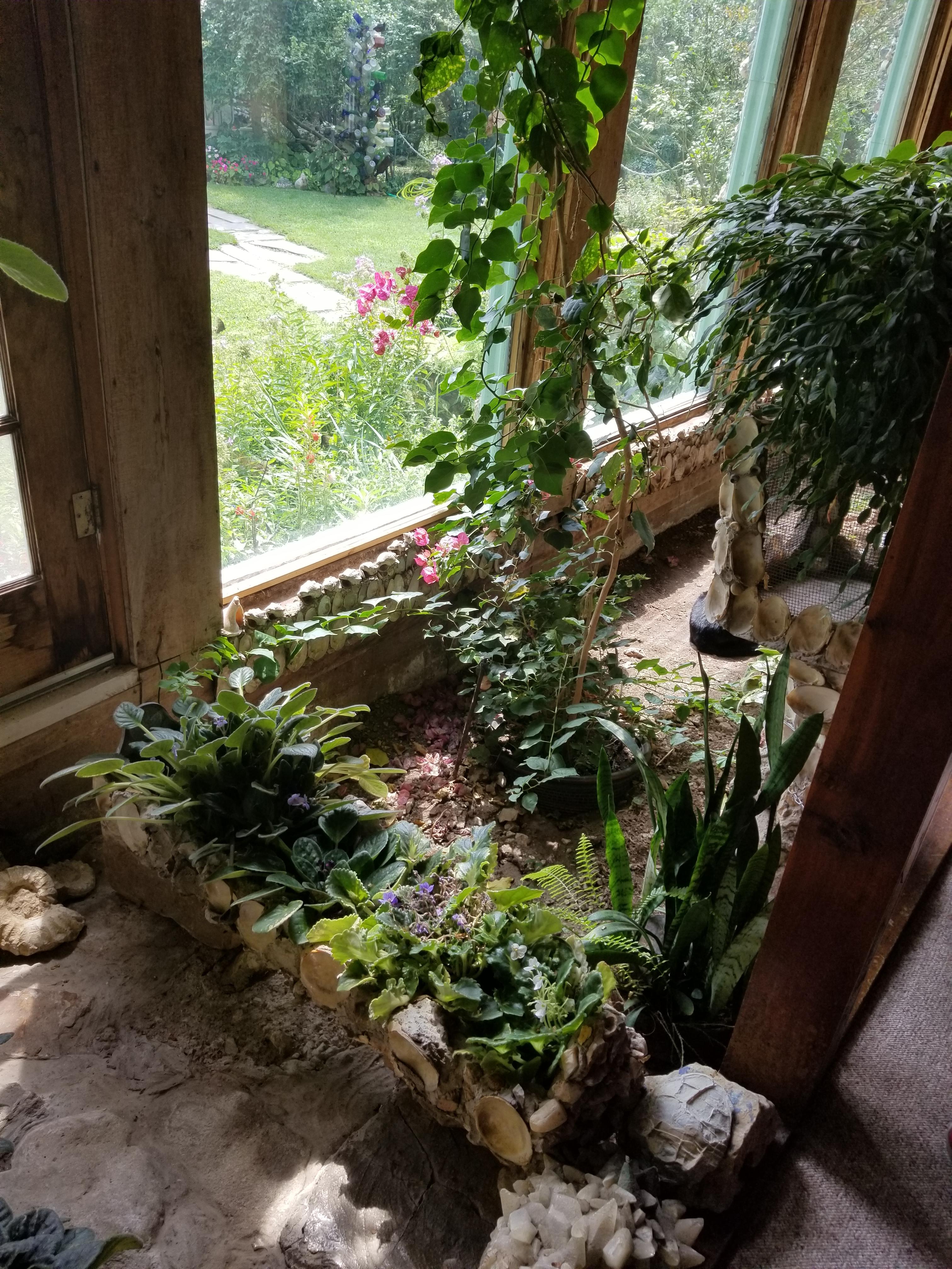 The inside of this house has bare earth on three sides to allow for