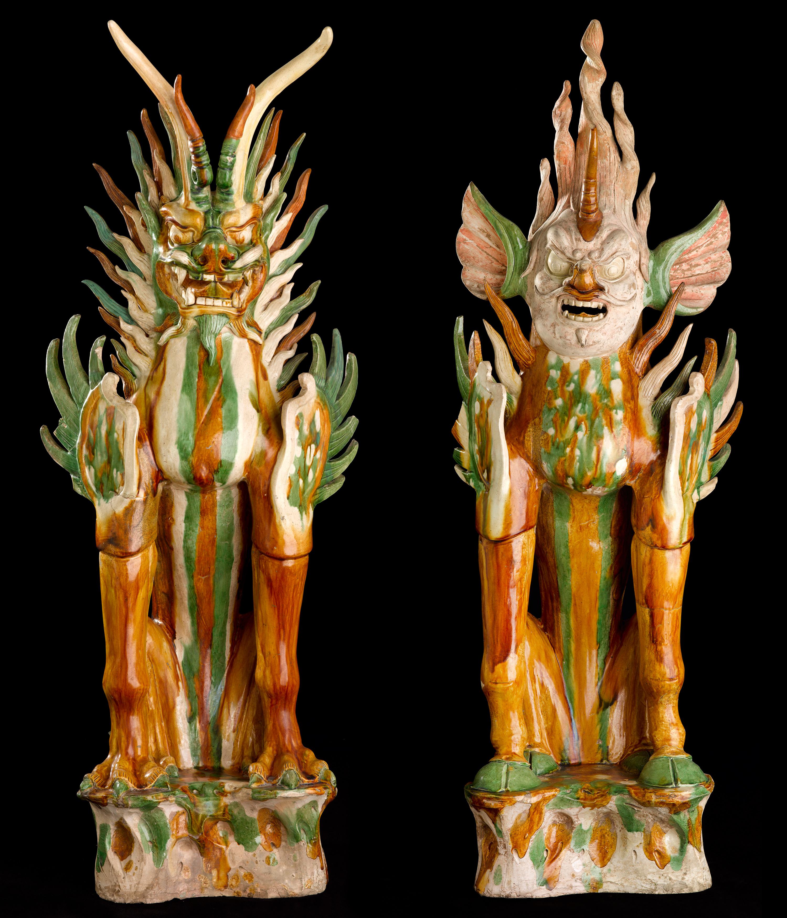 Pair of ceramic tomb guardians (zhenmushou) with beast and human face